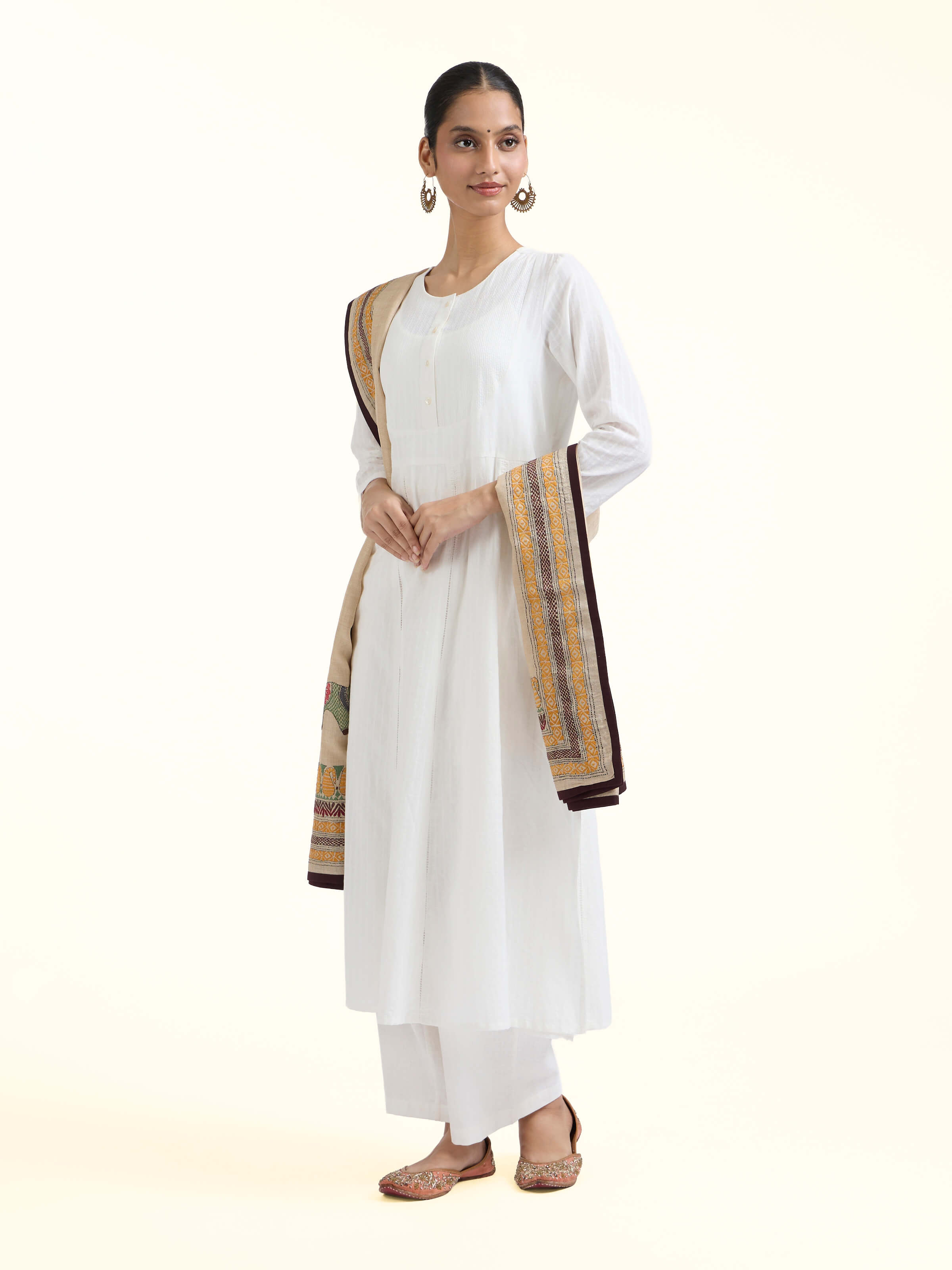 Side view of beige tussar silk kantha embroidered dupatta highlighting natural texture