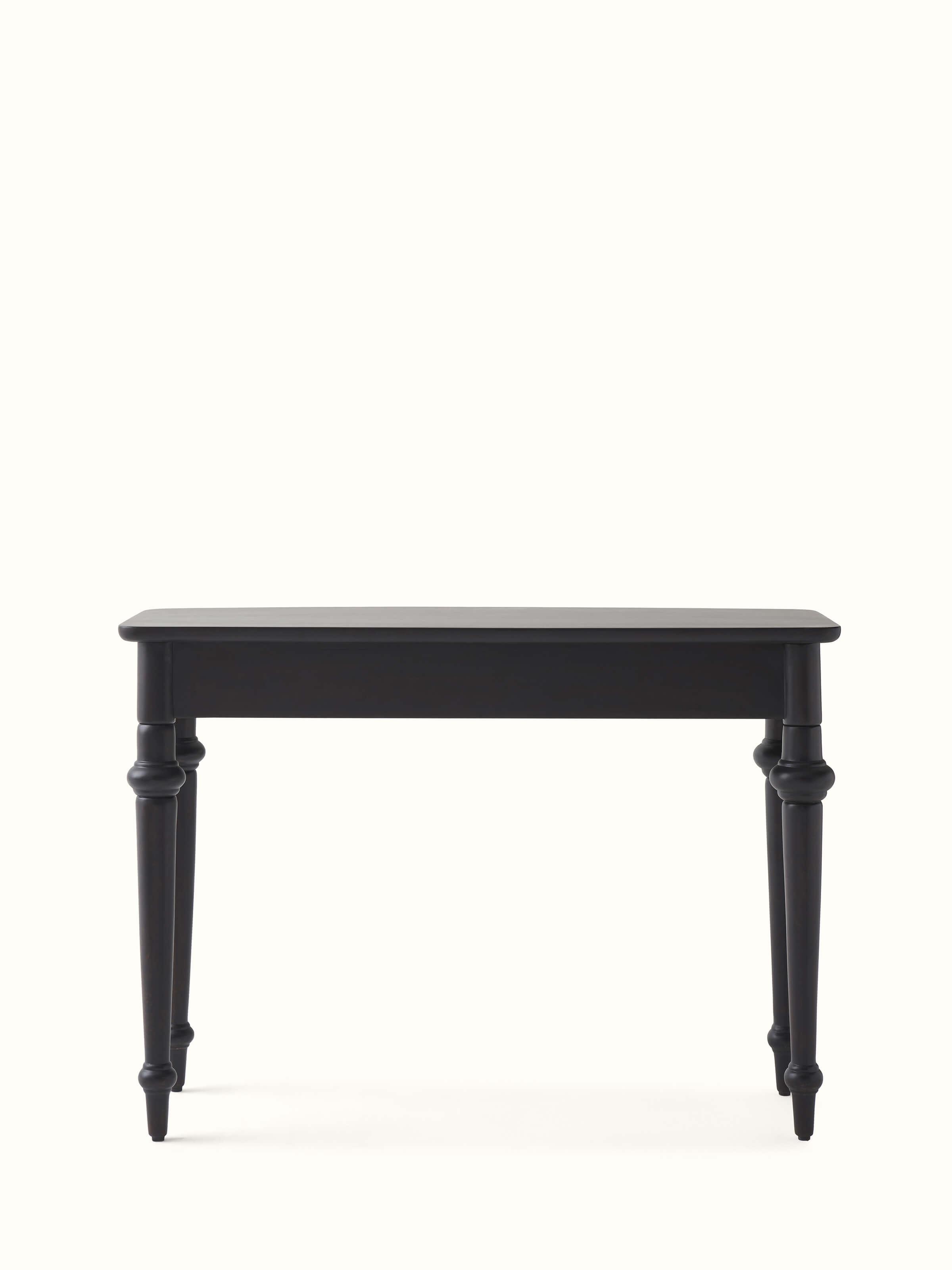 Side angle view of the Sheesham wood and brass tarkashi console table, showing its sleek and elegant design.