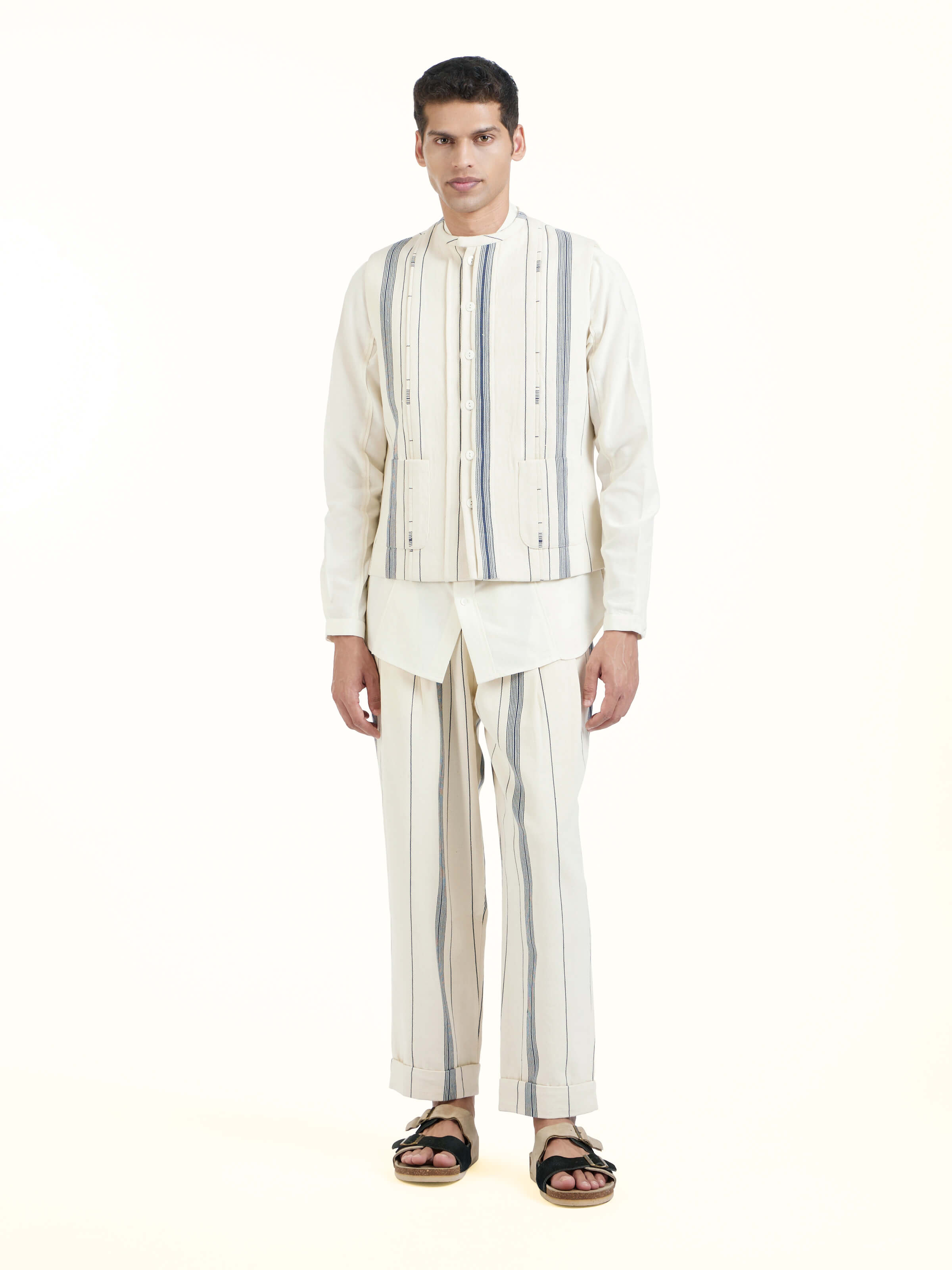 Front view of ivory cotton handloom sleeveless jacket showcasing clean lines and handwoven texture