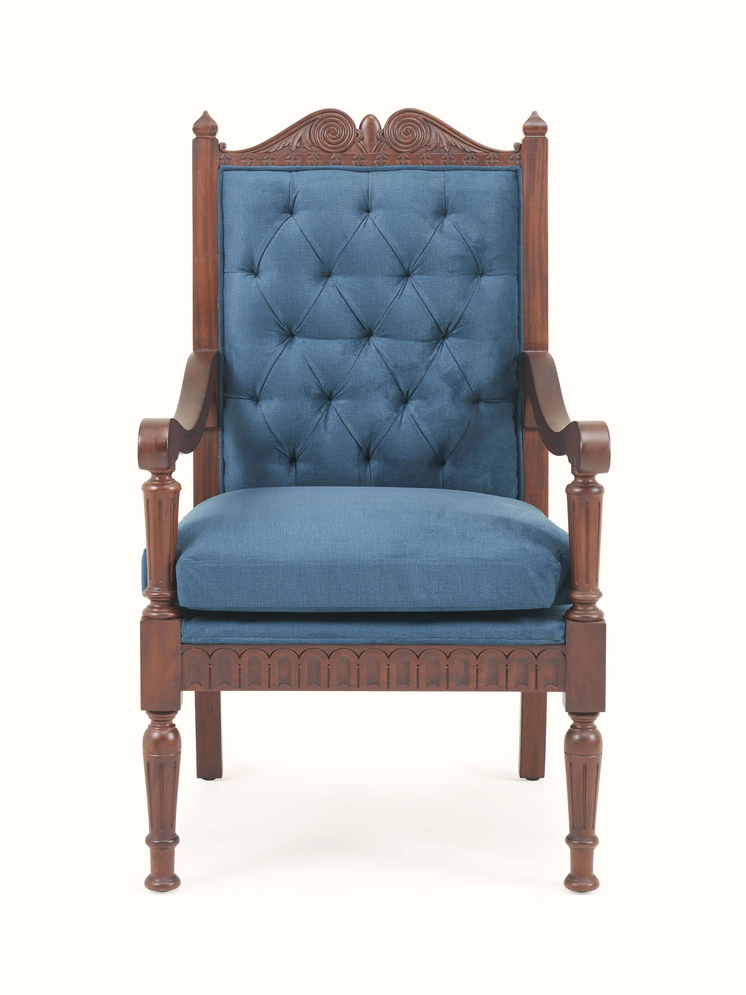 Front view of upholstered mahogany wood arm chair highlighting plush seat and detailed woodwork