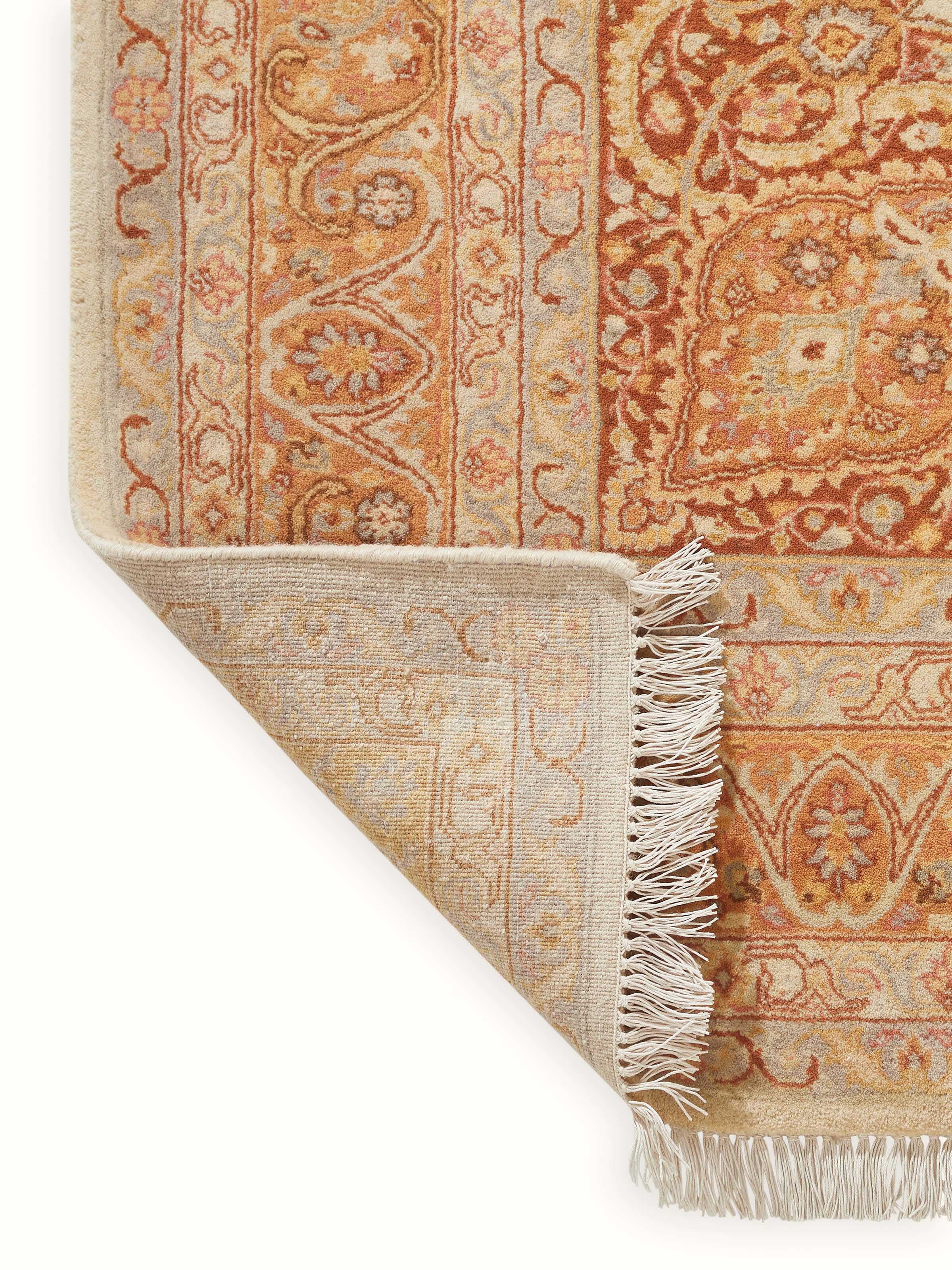 Detailed view of the Traditional Ziegler Rust Bhadohi Wool Hand Knotted Rug craftsmanship