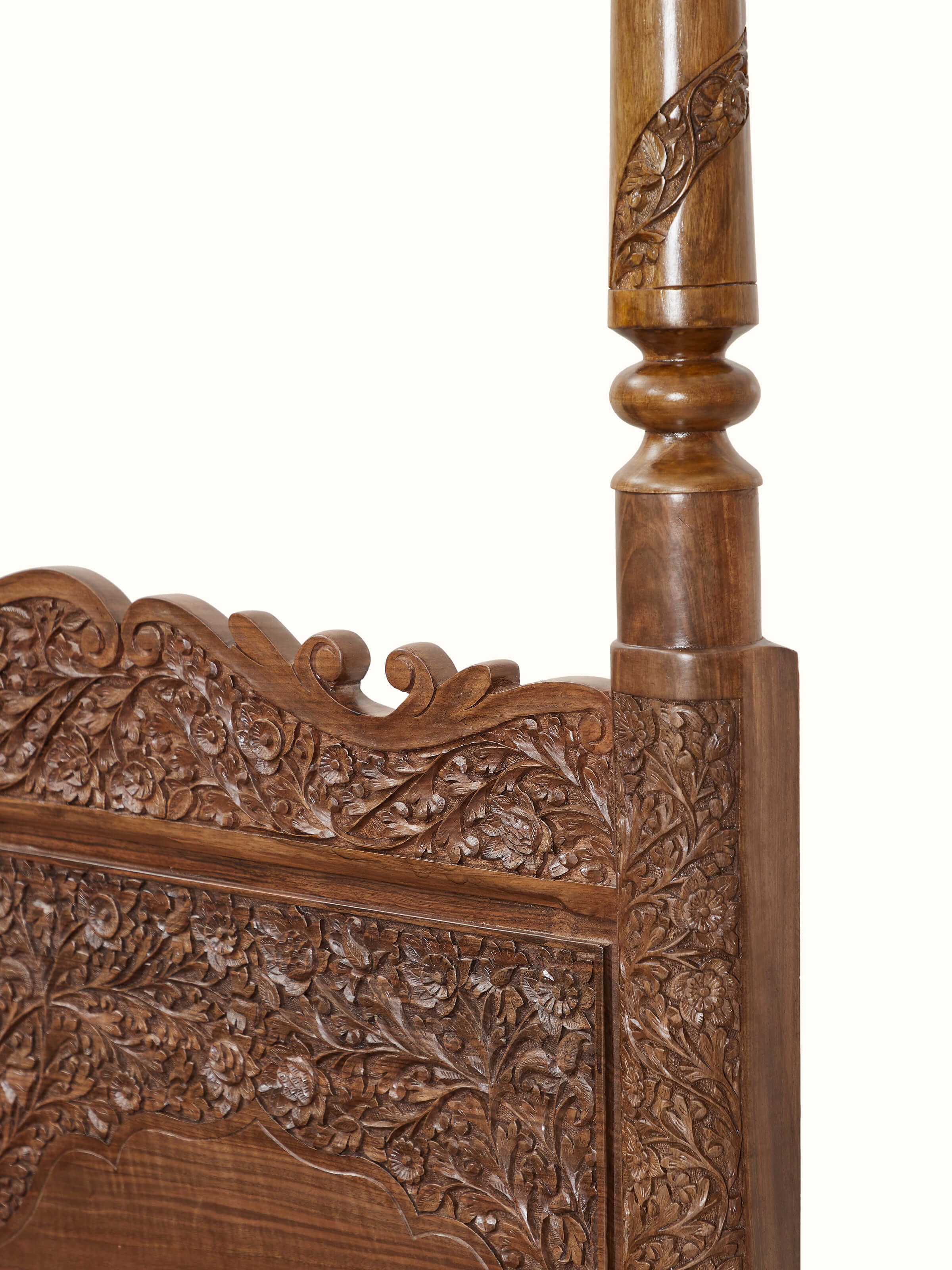 Close-up view of Carved Walnut Wood Poster Bed showcasing ornate carving and premium wood finish
