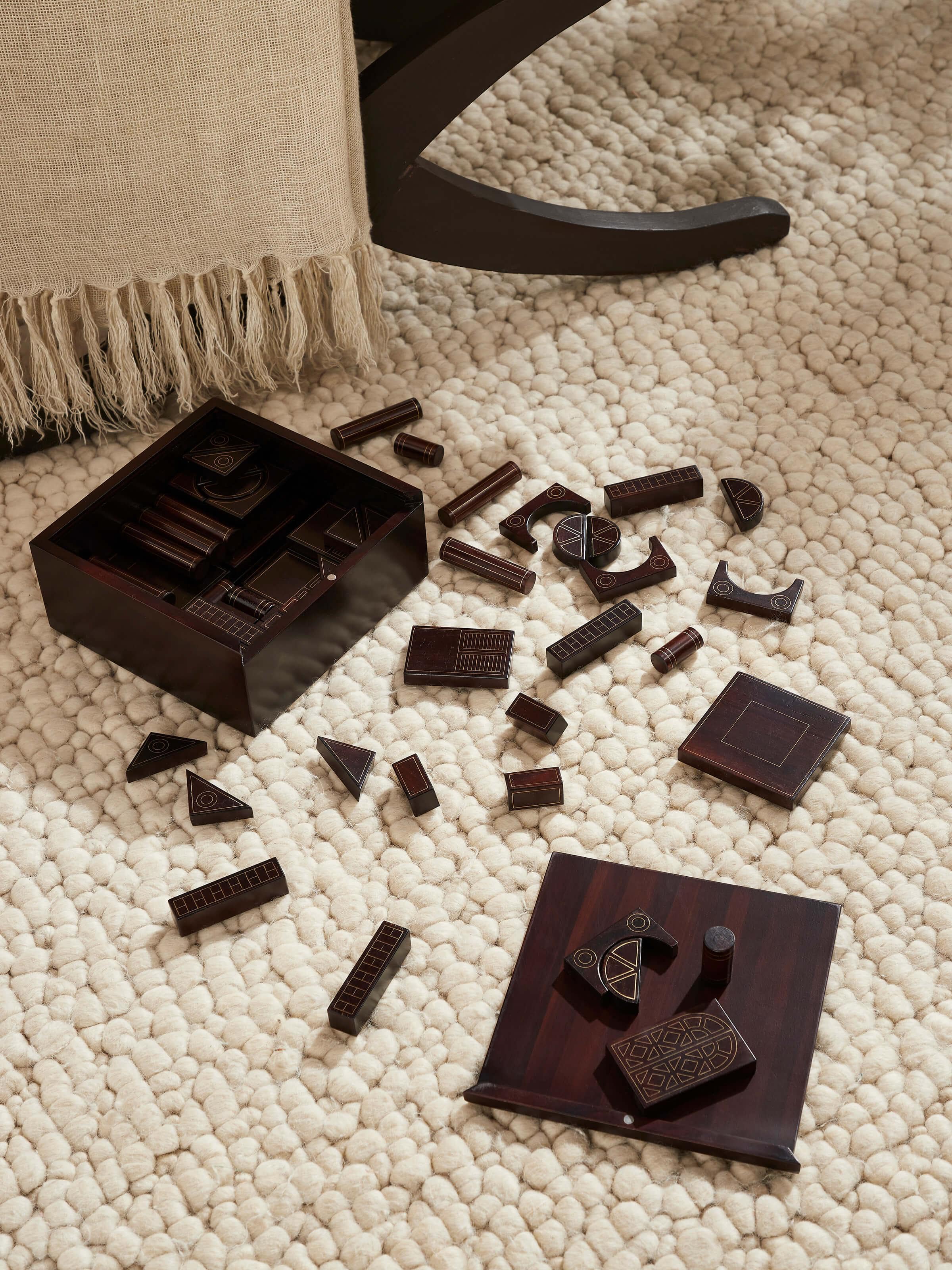 Side view of Tarkashi Construction Block Game displaying the blocks arranged in an intricate pattern