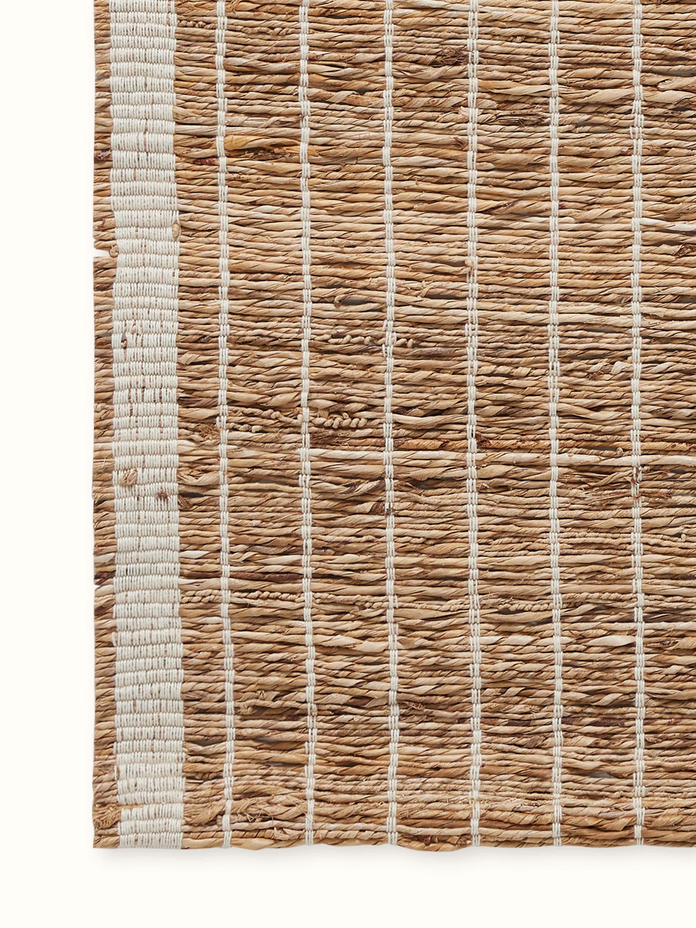 Close-up showcasing the fine weave and natural fiber details with subtle striped design