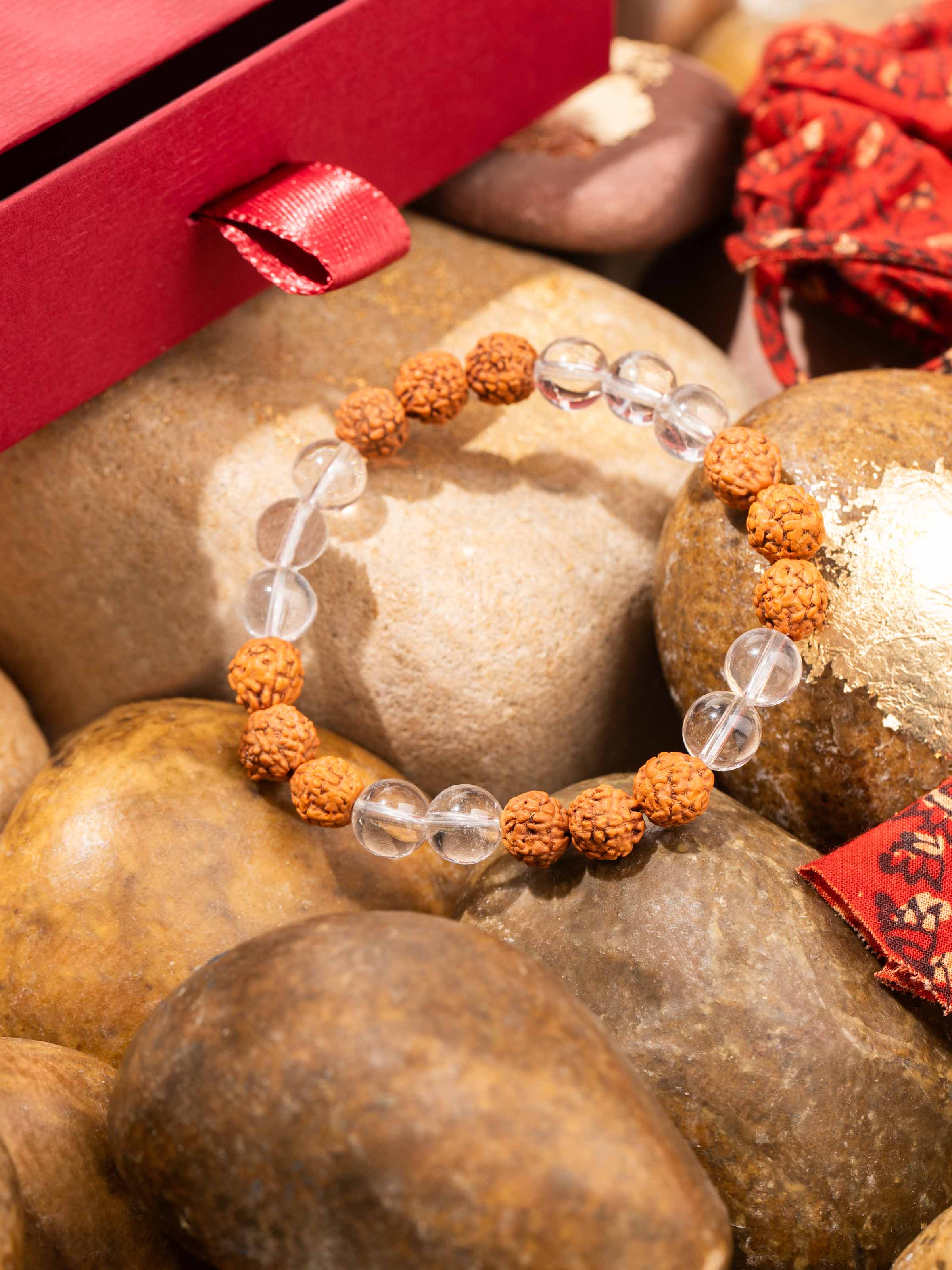 Side view of spiritual Rudraksha and Sphatik bracelet on a natural hand pose