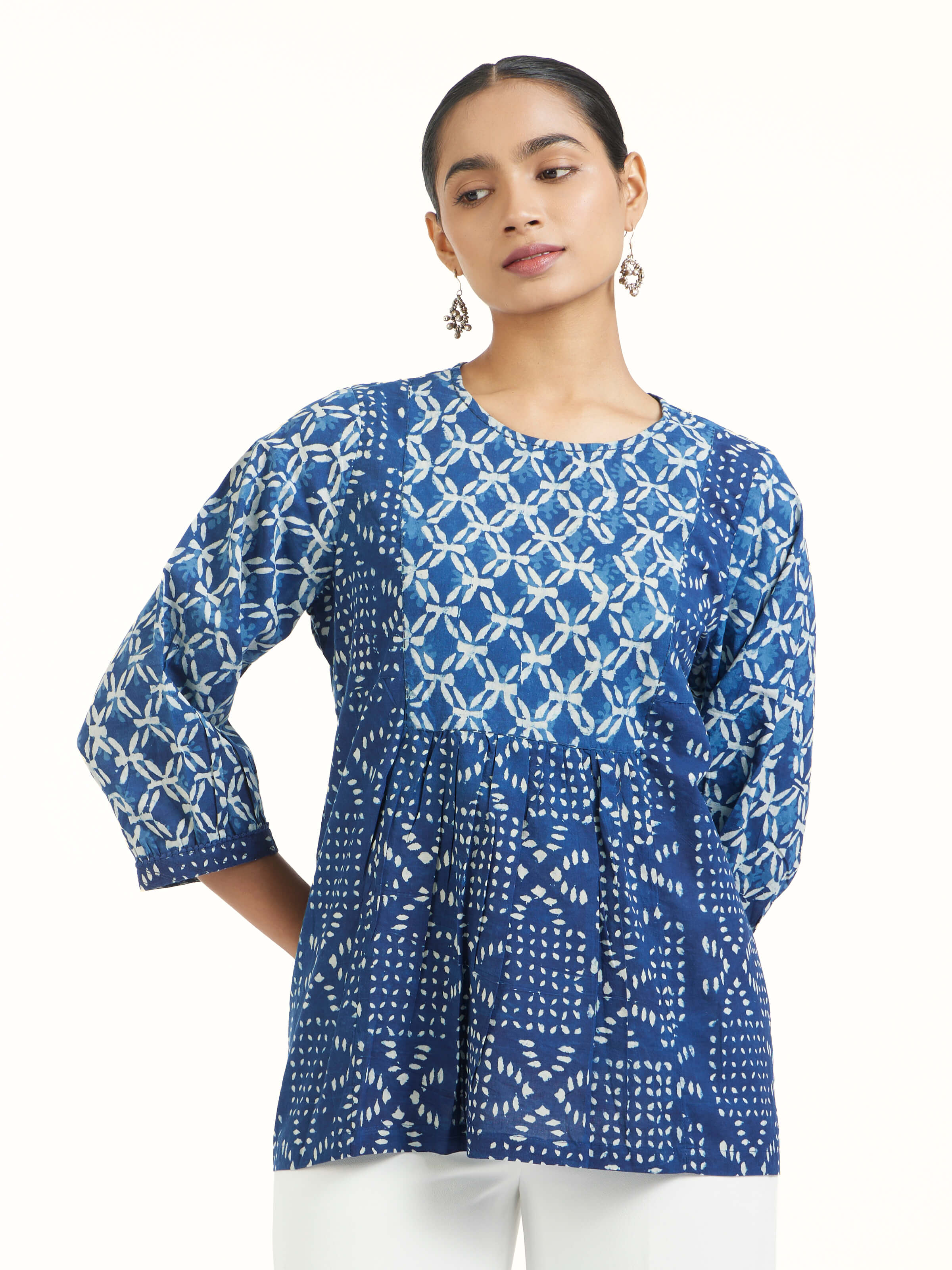Angled view of Sugandhika cotton dabu block printed top highlighting dabu print technique