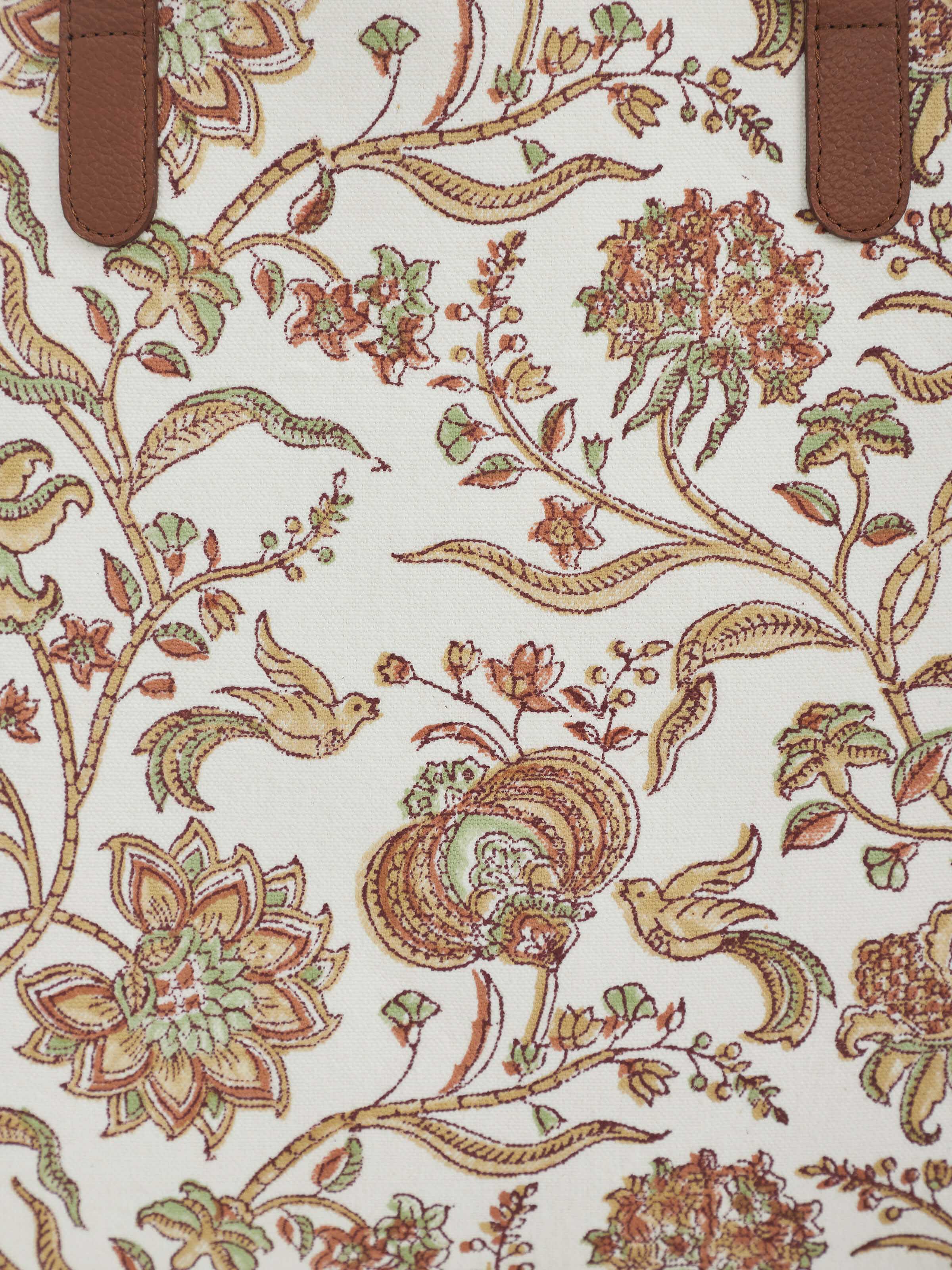 Side view of Leather & Textile Hand Block Printed Tote Bag revealing sturdy leather handles and detailed stitching.