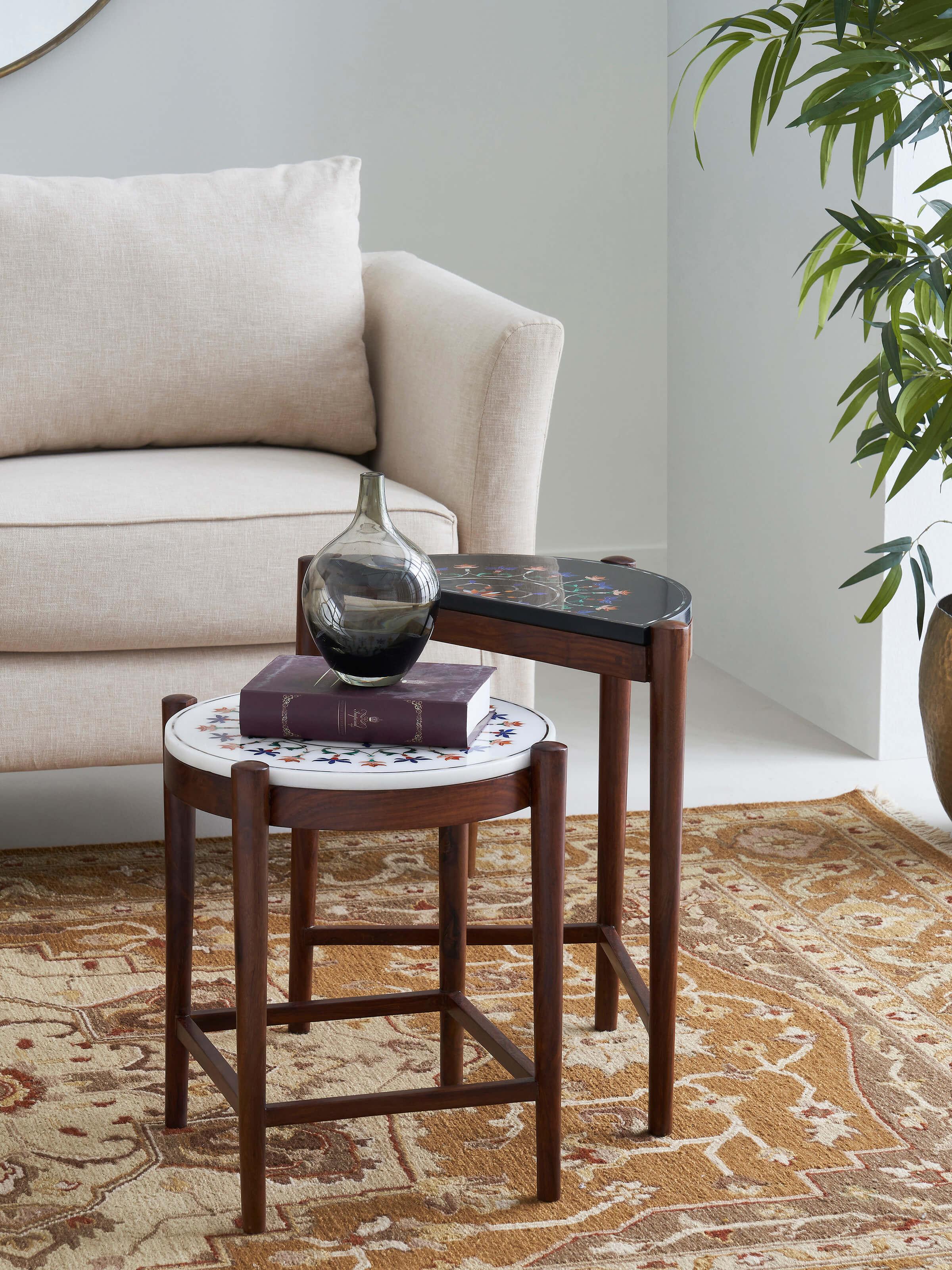 Side view of marble inlaid sheesham wood nesting table set, highlighting the elegant marble inlay details and wood grain