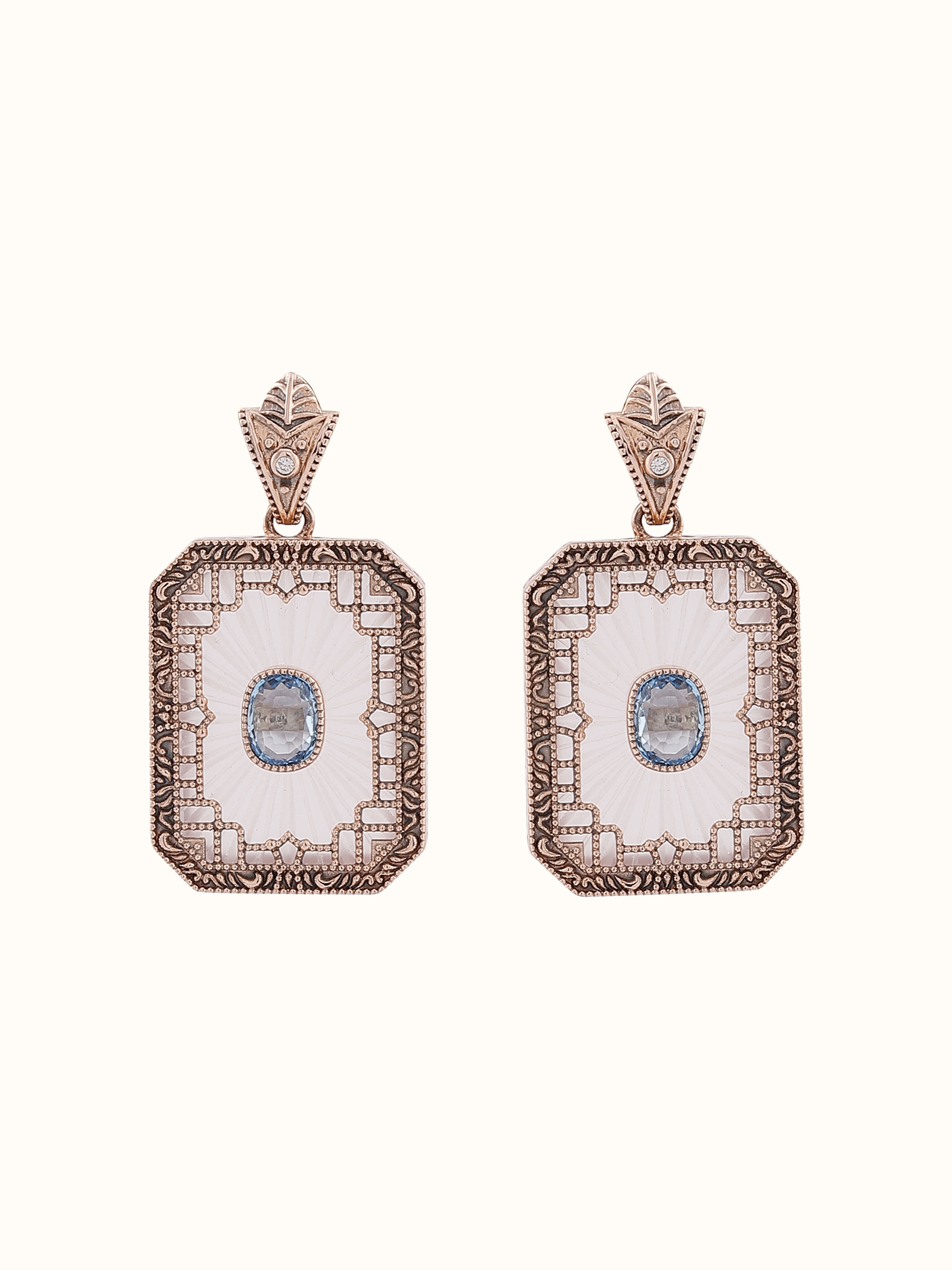 Front view of lapidary 14 karat gold drop earrings