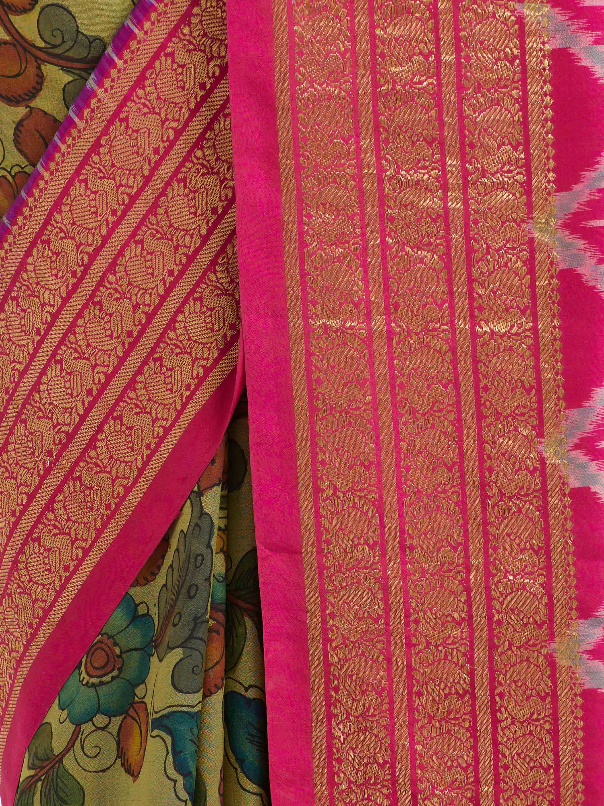 Detail view of silk Ikat Kalamkari saree showing fabric texture and intricate artwork
