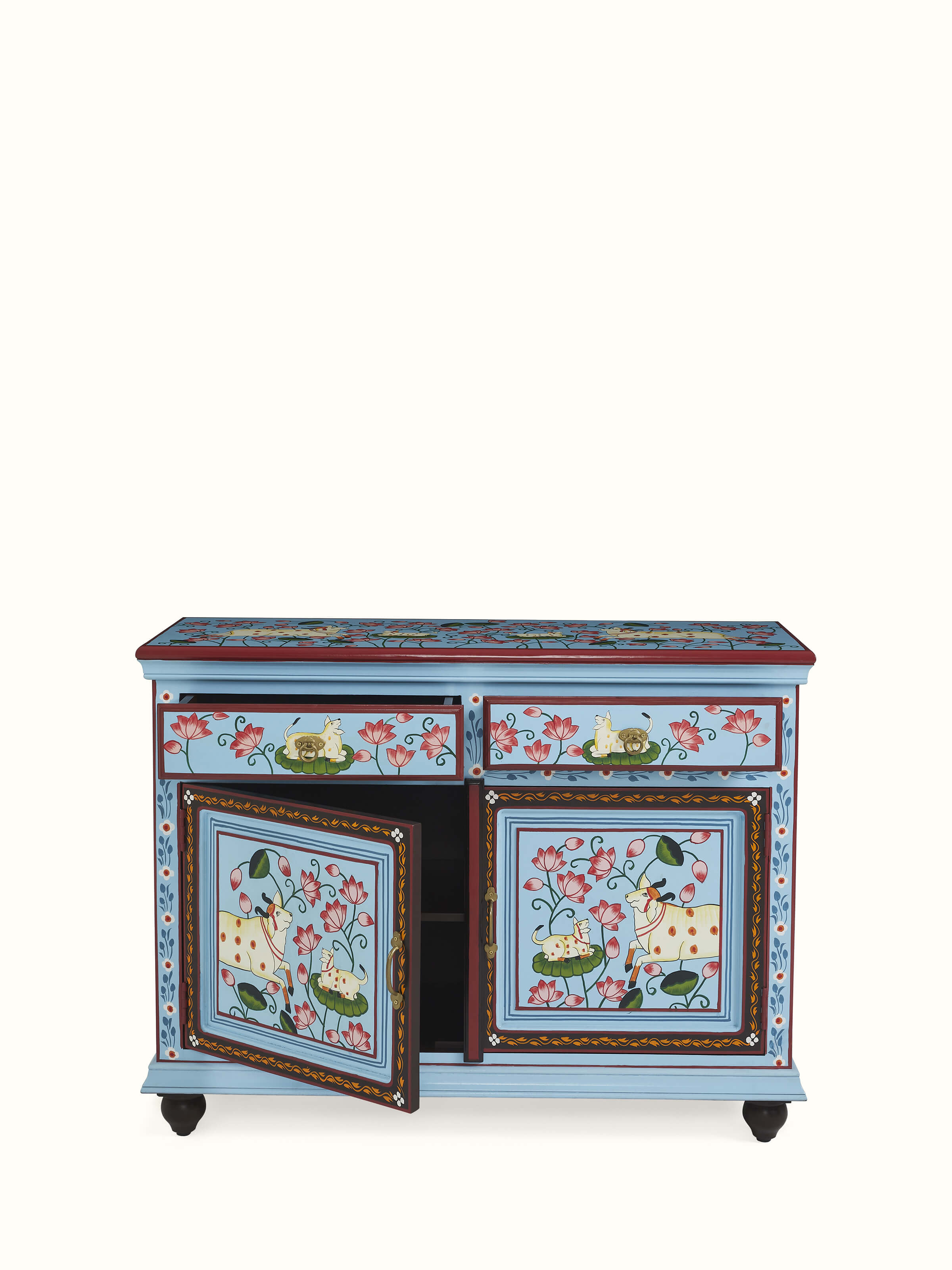 Angled view highlighting carving detail and drawer arrangement – timeless Indian furniture