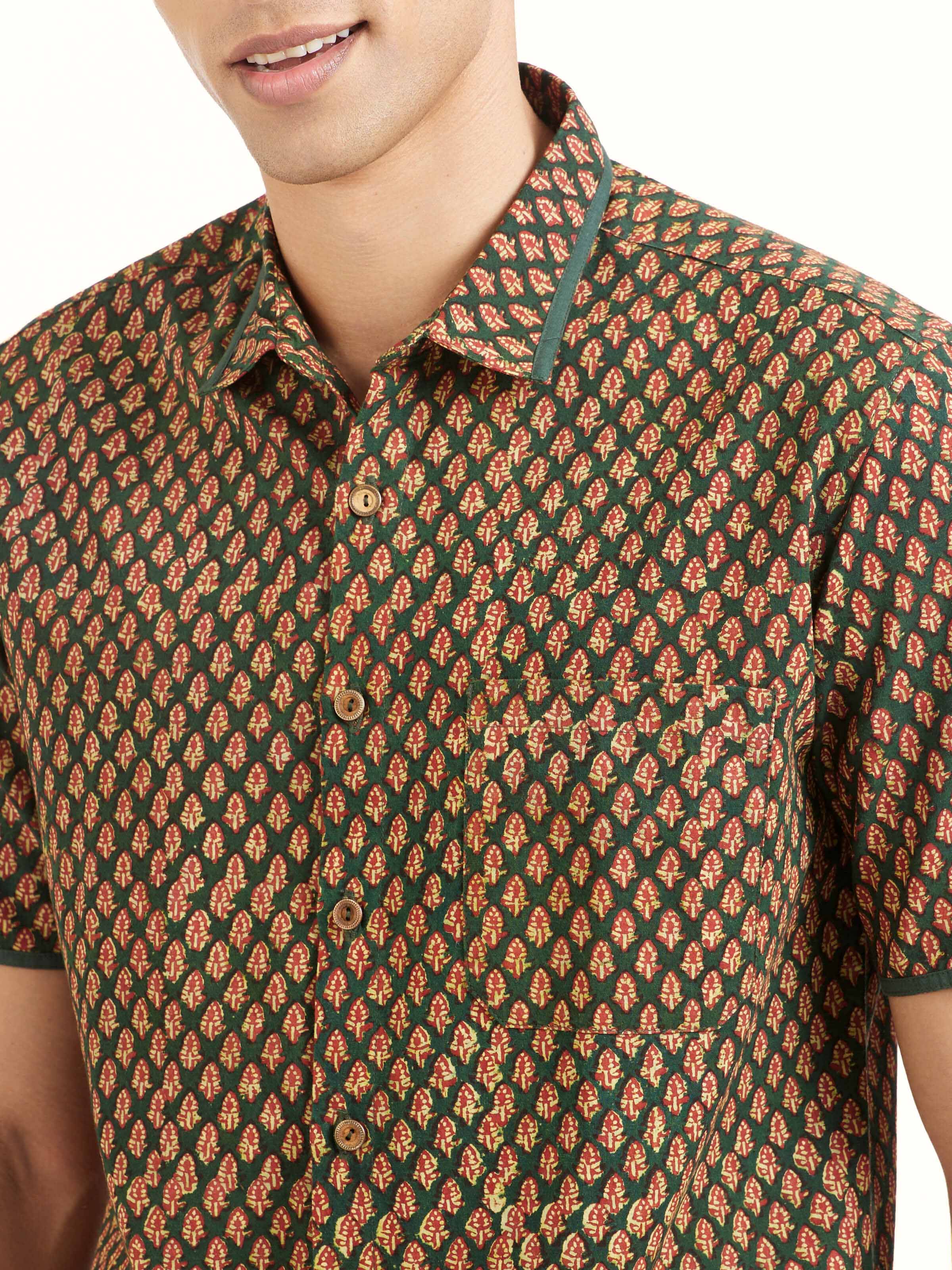 Detail view of teal fadad hand block print pure cotton shirt showing print clarity and fabric texture