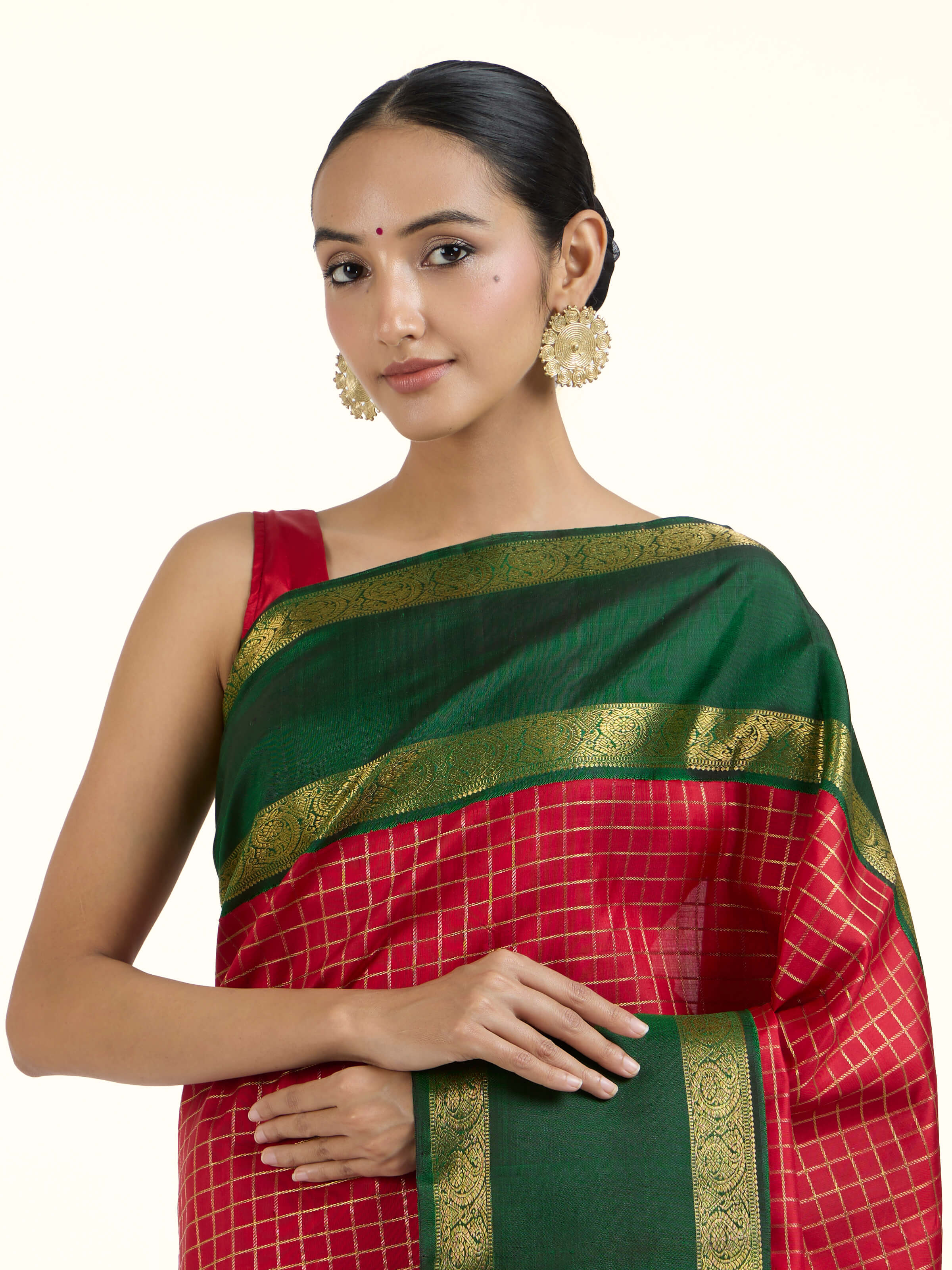Angled view of green silk Kancheepuram saree highlighting traditional weave