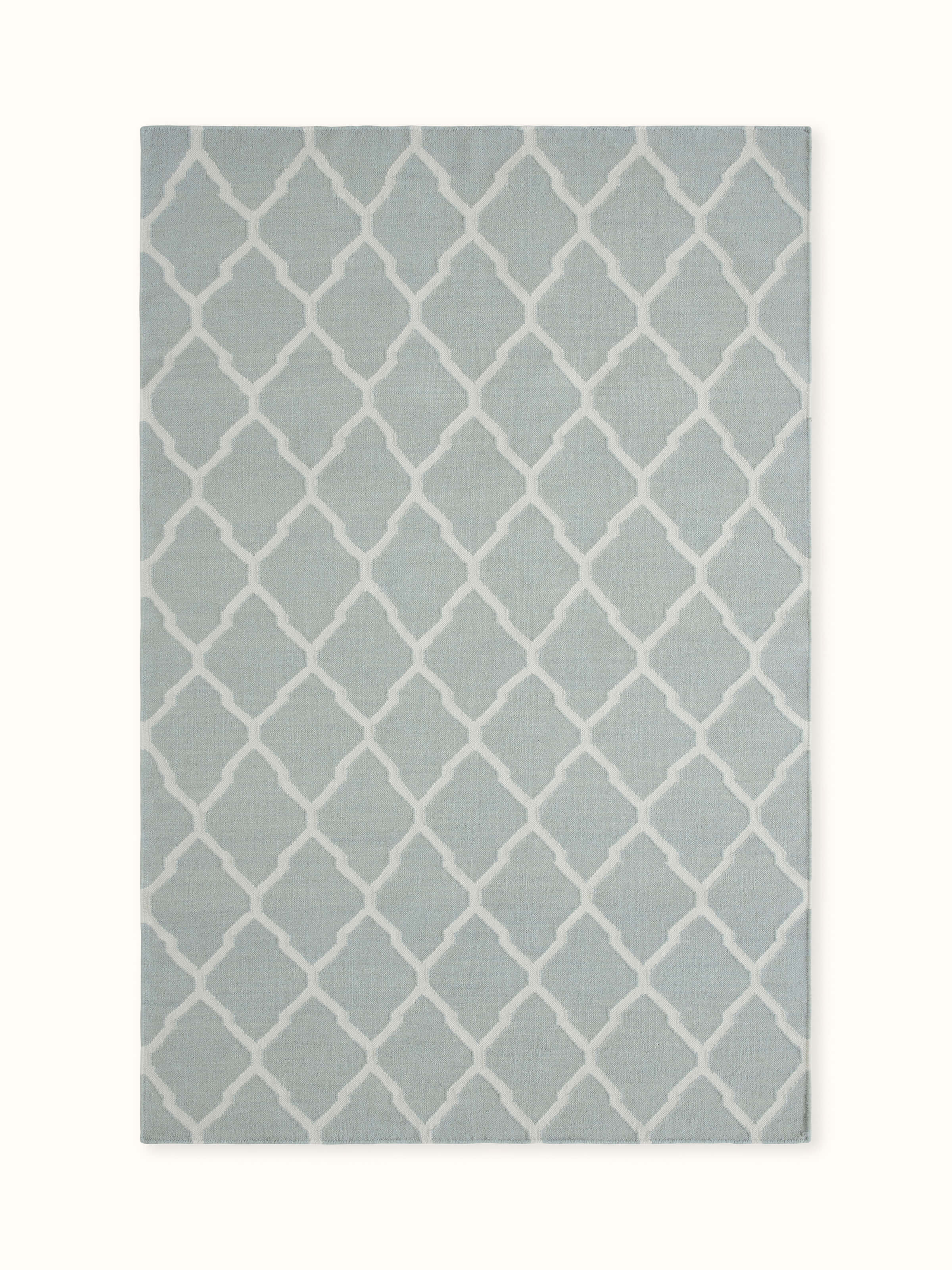 Front view showcasing the soft light aqua melange tones and geometric pattern