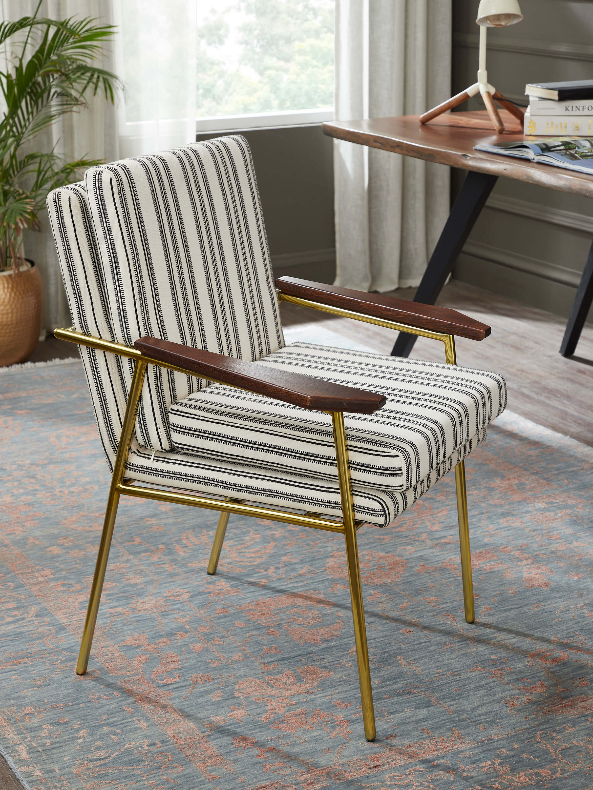 Side view of Upholstered Metal Study Chair emphasizing the ergonomic design and sleek metal frame.