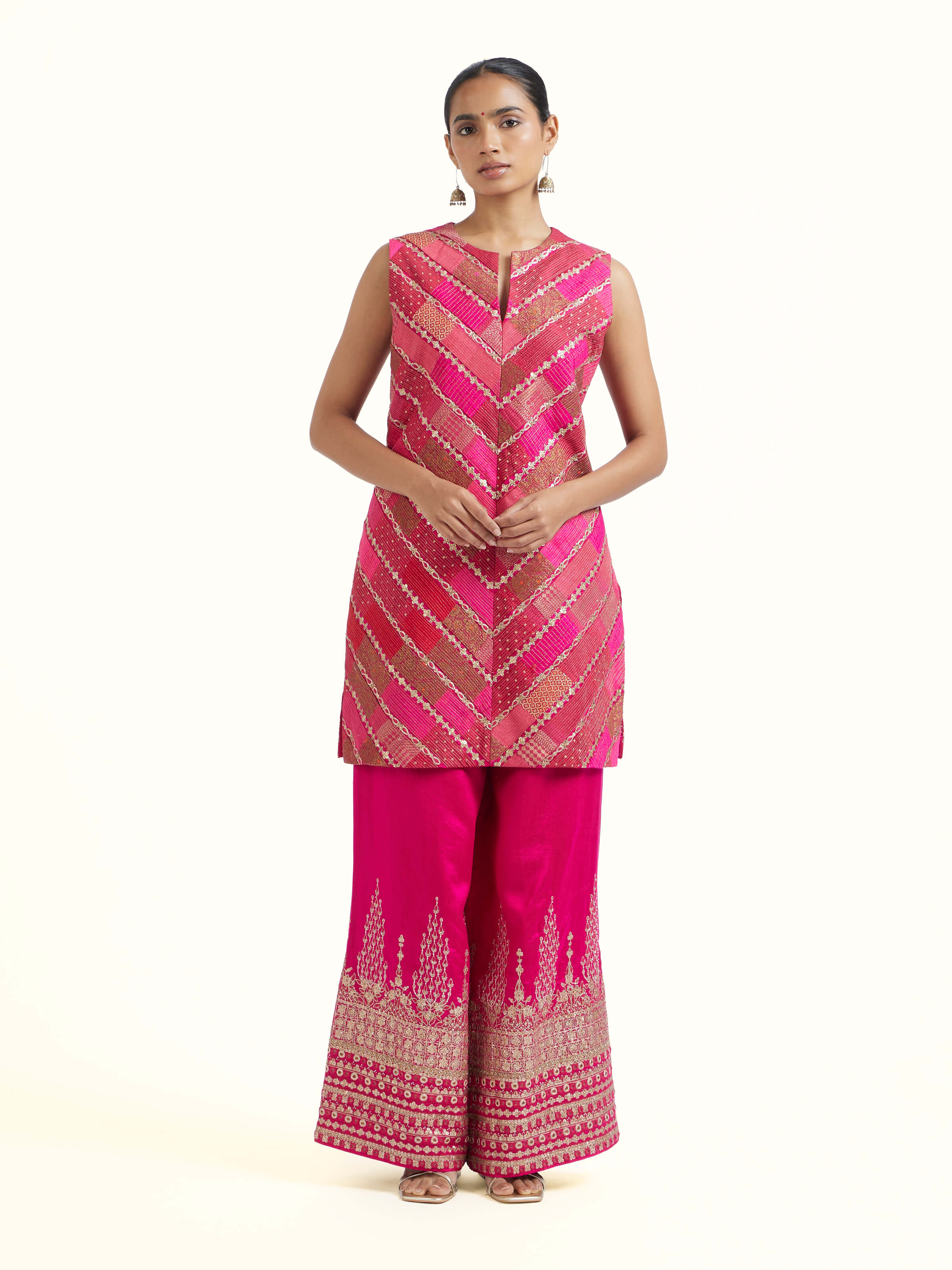 Front view of pink silk hand embroidery kurta set showcasing intricate handwork