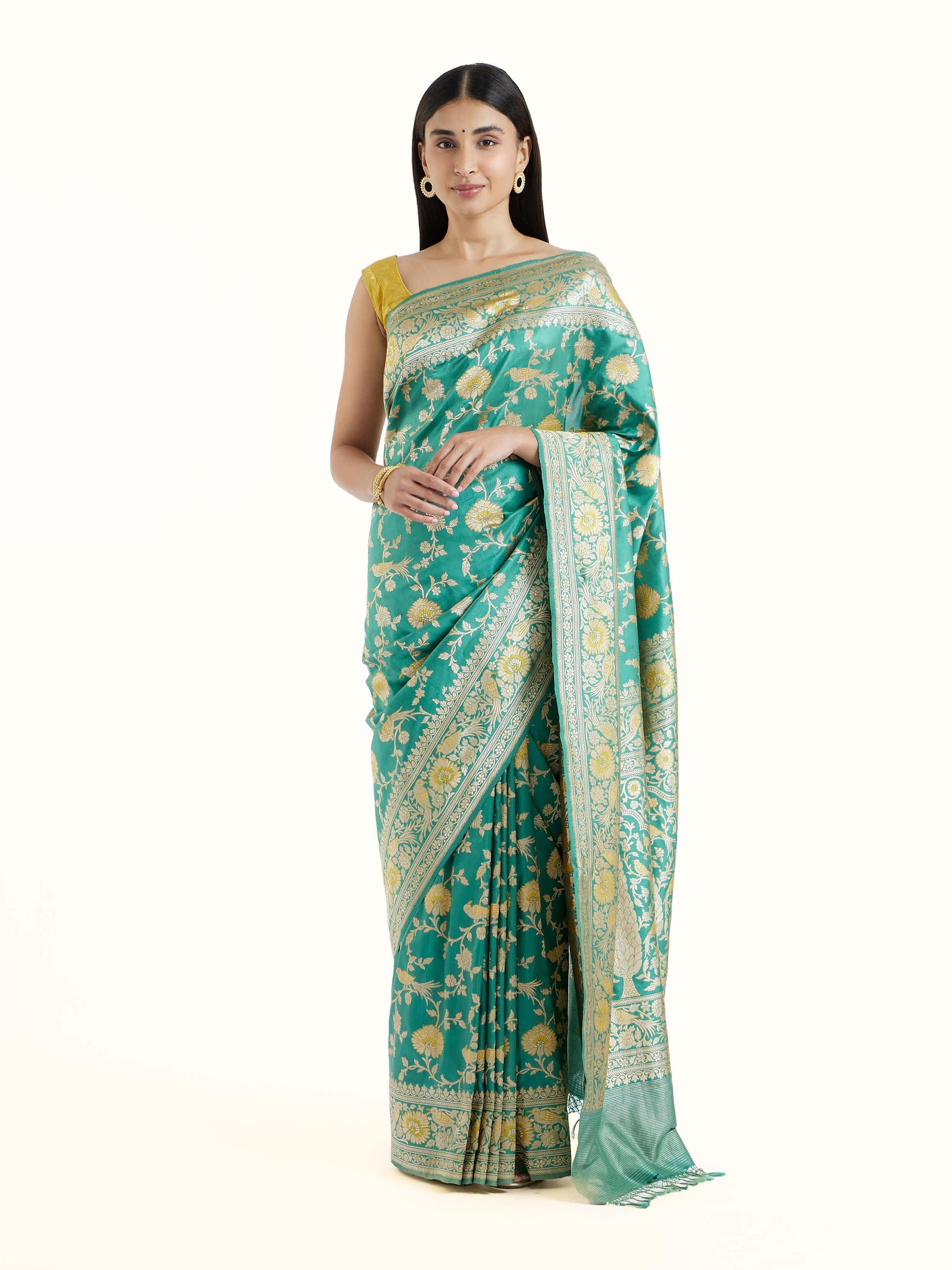 Front view of sea blue mulberry katan silk Banarasi saree with rich zari woven motifs