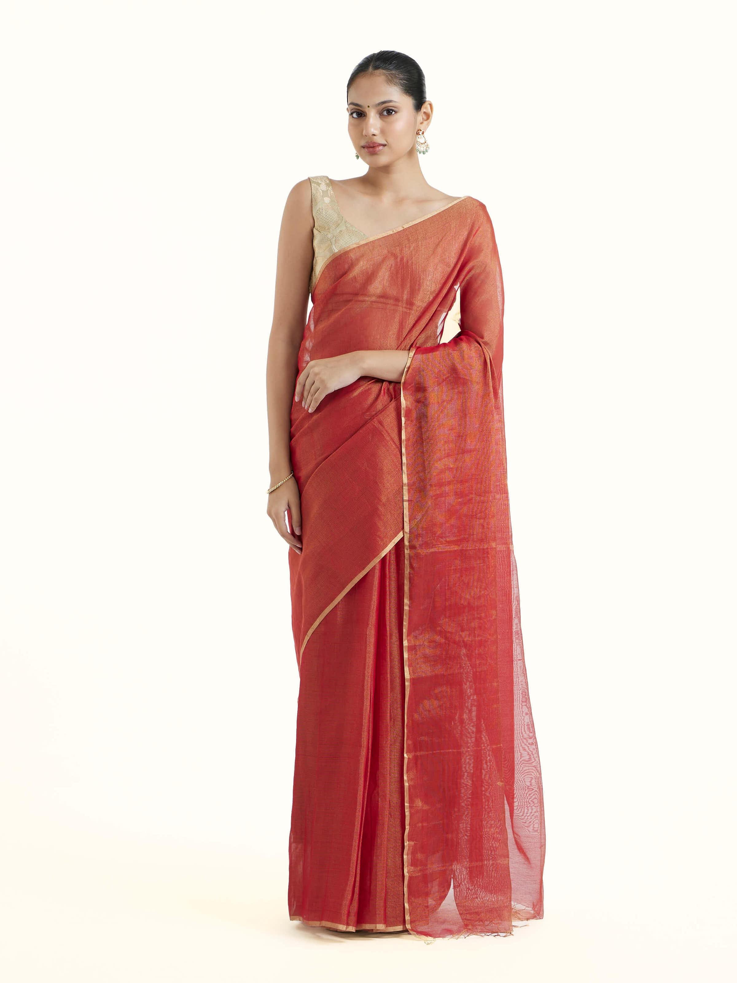 Front view of red cotton silk Maheshwari saree with traditional woven border