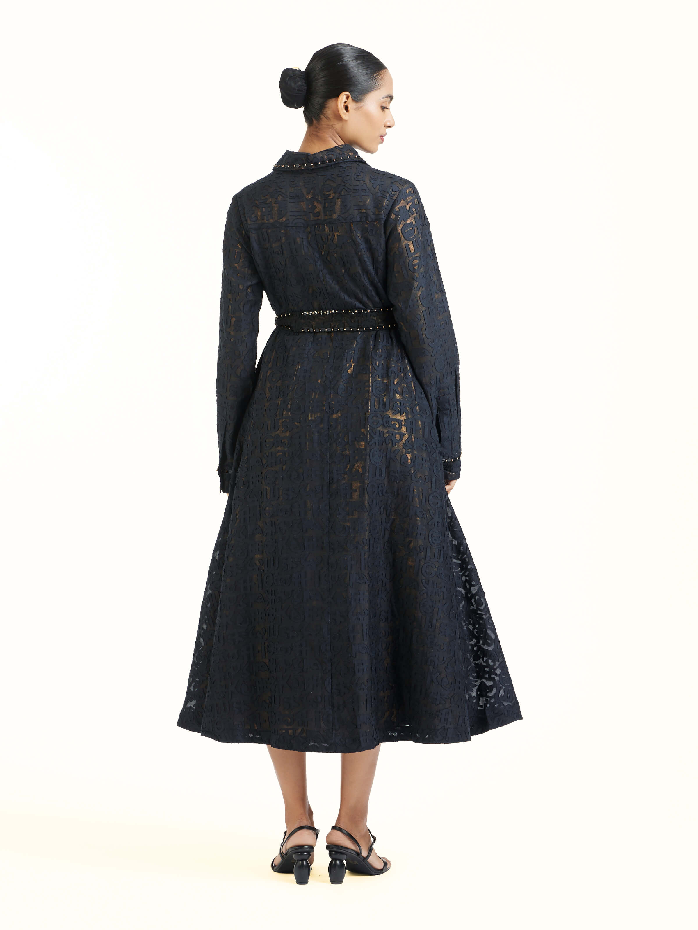 Back view of black handloom cut work dress displaying overall design