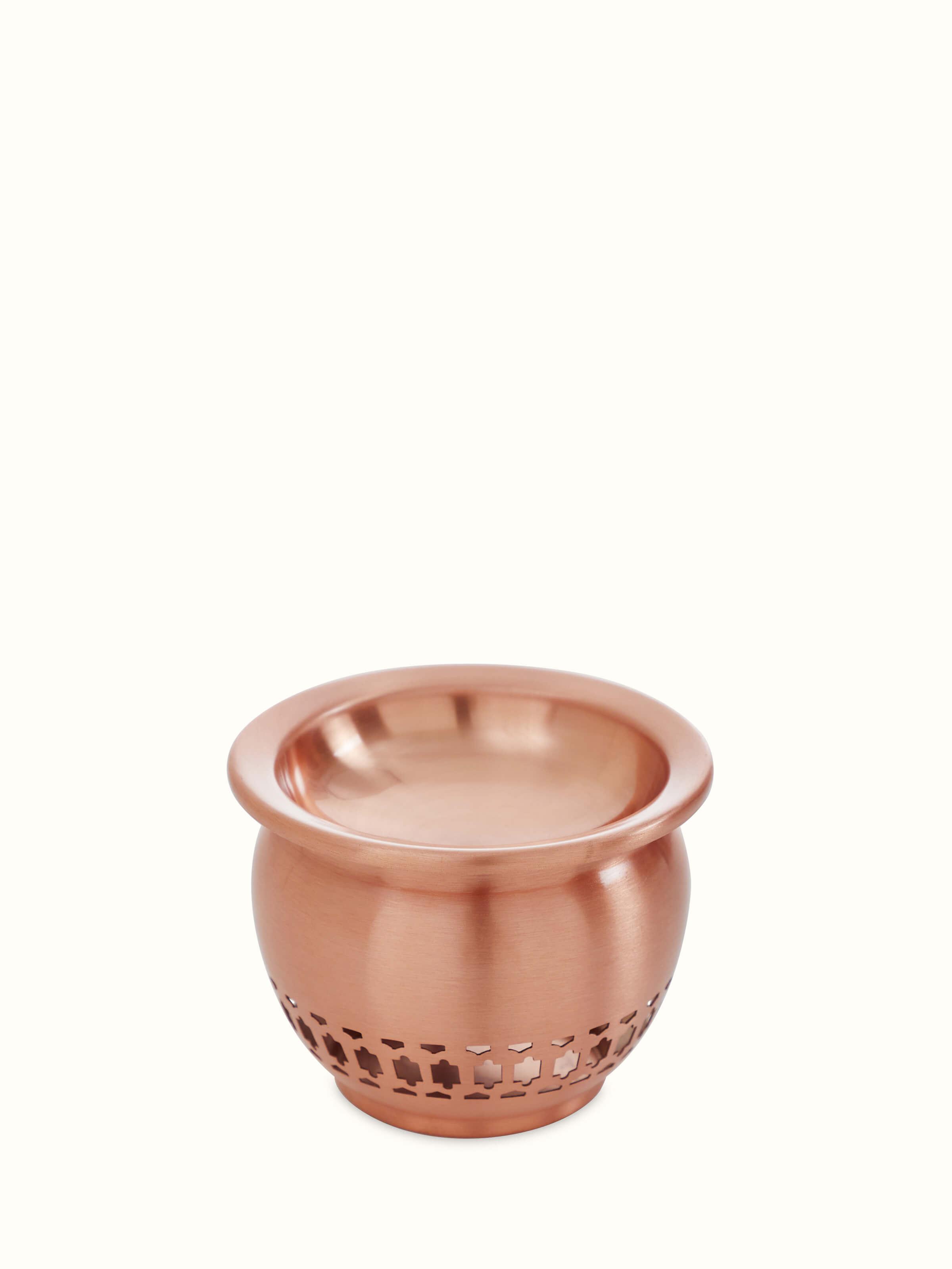 Front view of natural copper diffuser showcasing sleek design and radiant finish
