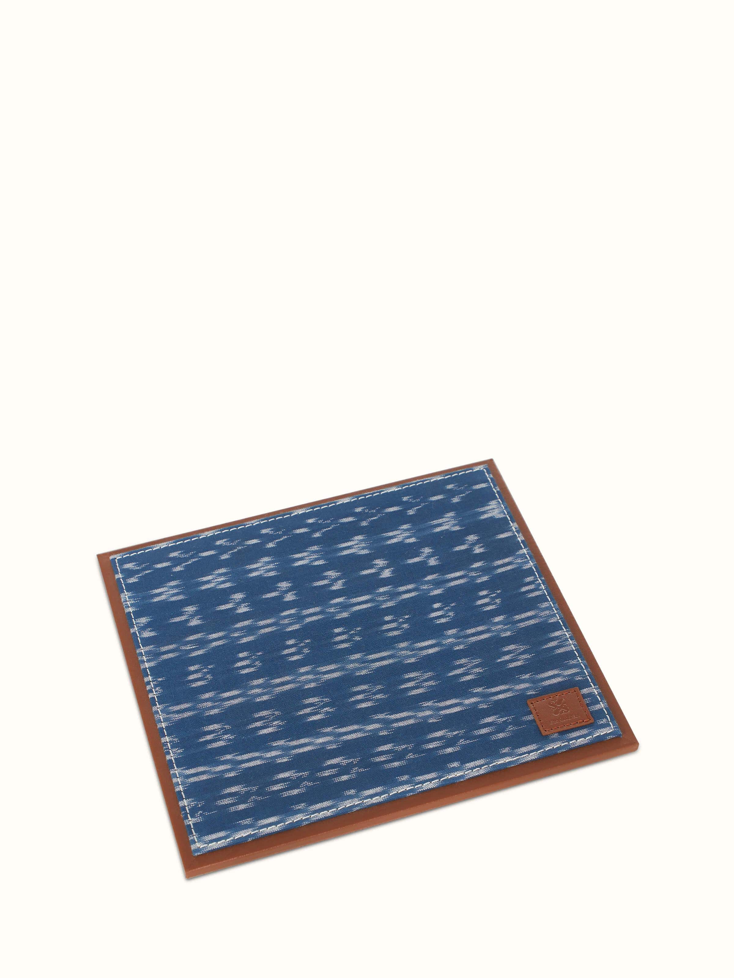 Close-up view of Leather Mousepad Blue, highlighting the smooth leather texture and precise stitching.