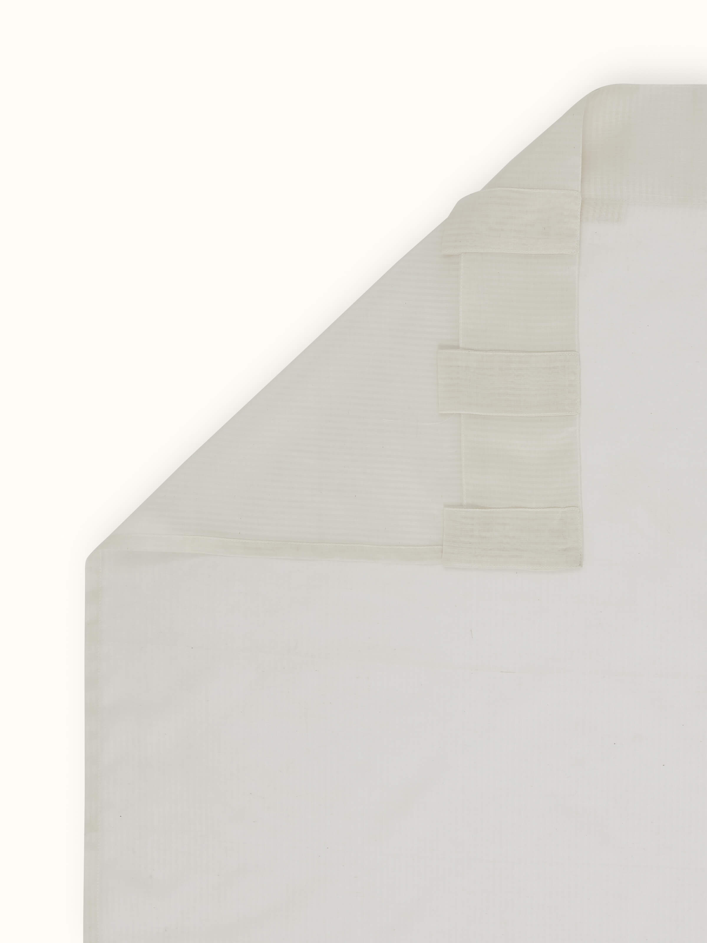 Back view of 9 ft Pragya ivory curtain – fine texture and fluid drape.