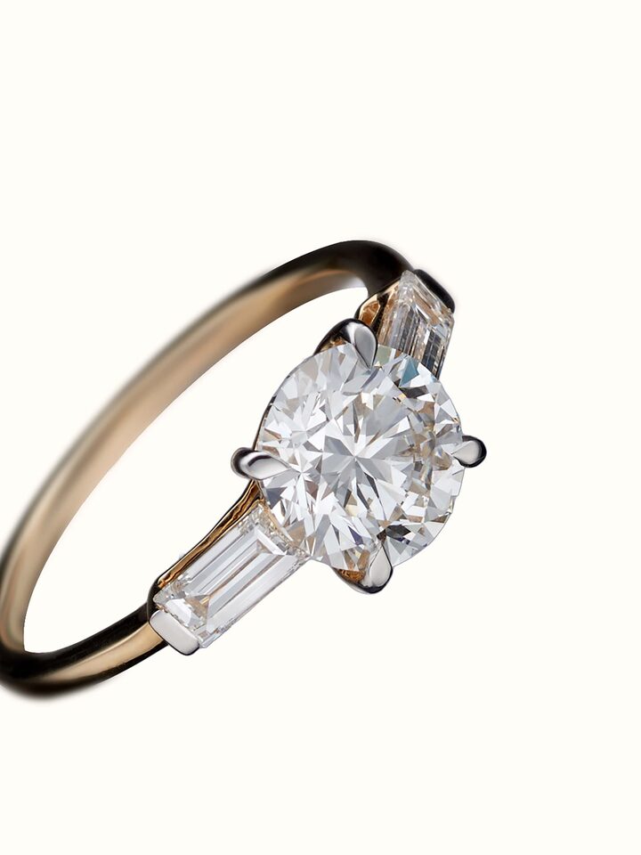angled view of open setting 14 karat gold ring