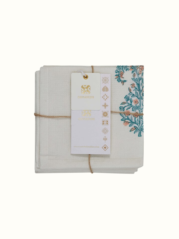 View of Ambi buta blue floral cotton Sanganeri block printed face towels showing multiple towels stacked together