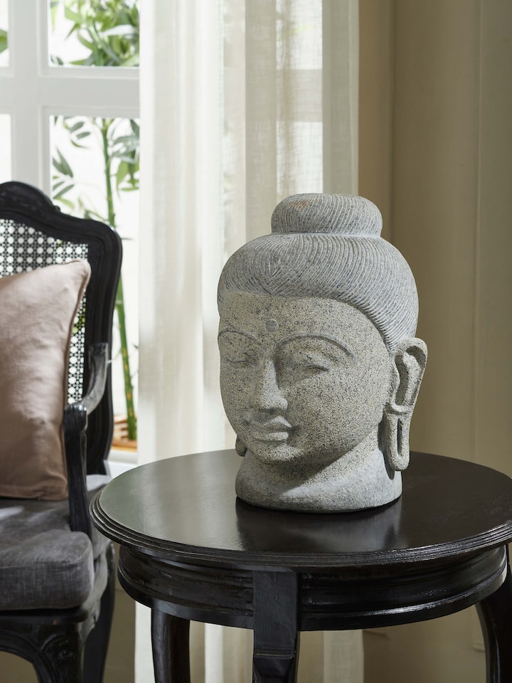 Left-side view of the Stone Carved Buddha Head Sculpture