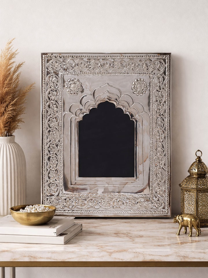 Styled view of Chetai Mehrab Silver Photo Frame styled in a home setting