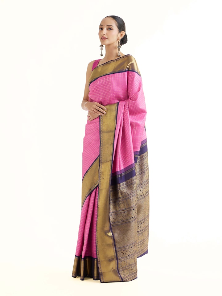 Side view of mauve silk Kancheepuram saree with graceful drape and contrast border
