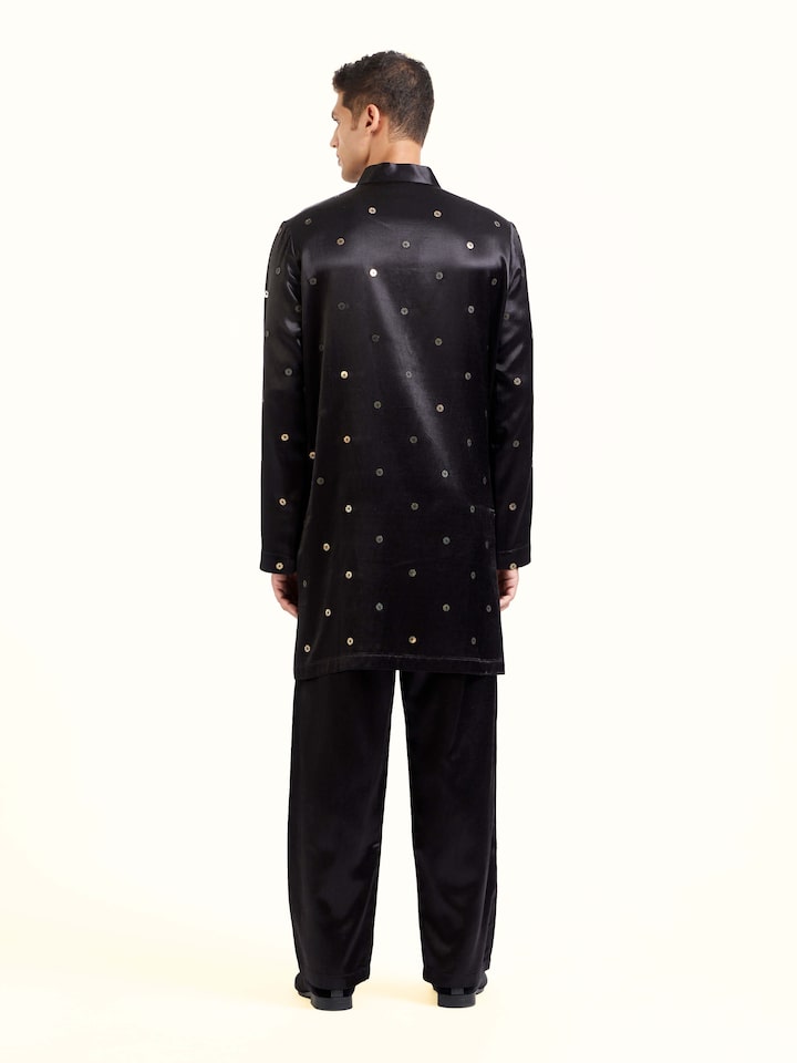 Back view of black hand embroidery long kurta displaying refined finish
