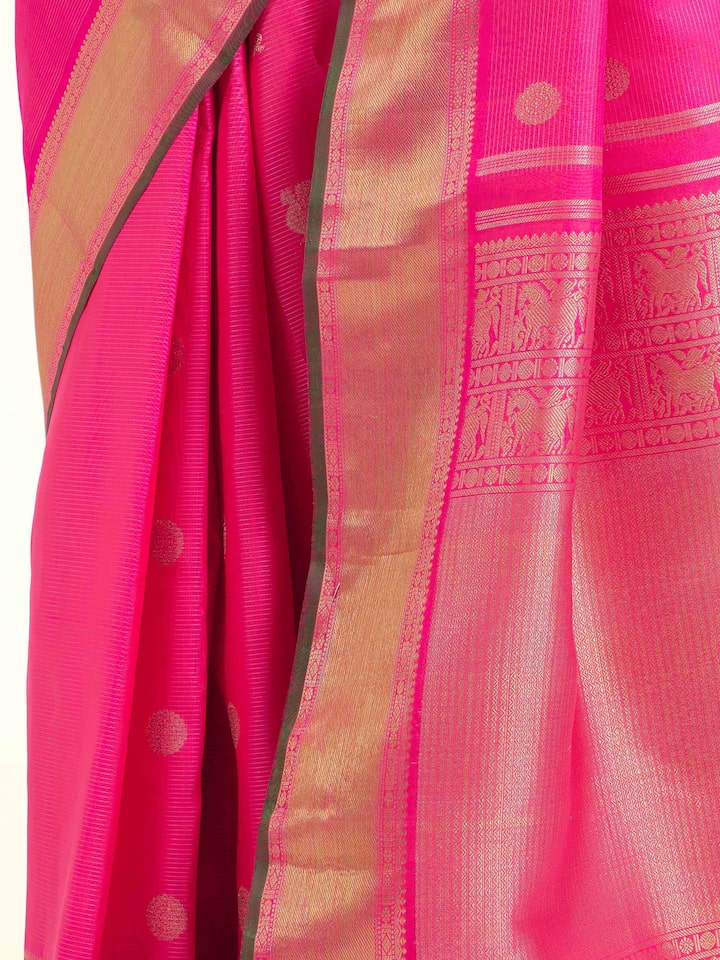Detail view of pink silk Kancheepuram saree showing silk texture and weaving details