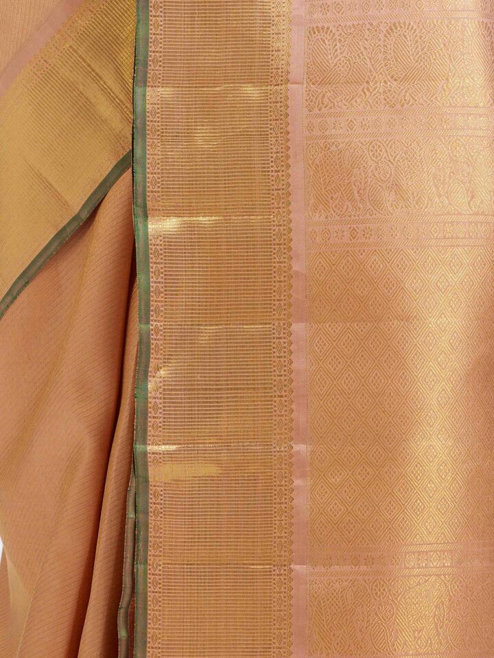 Detailed view of Pink Kancheepuram Silk Zari Saree focusing on the fine craftsmanship and texture