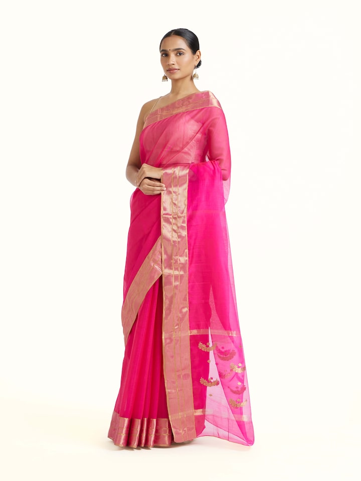 Side view of Pink Mulberry Silk Chanderi Saree highlighting the detailed craftsmanship and elegant silhouette