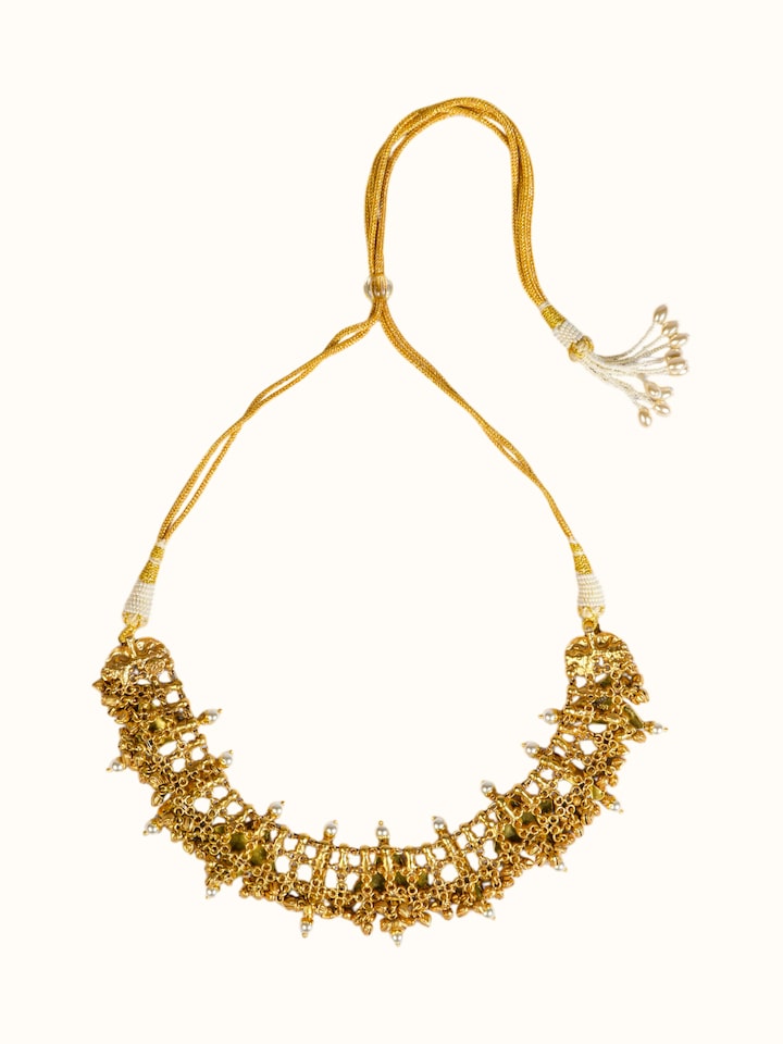 back view of silver smithing gold plated kundan necklace showing clasp