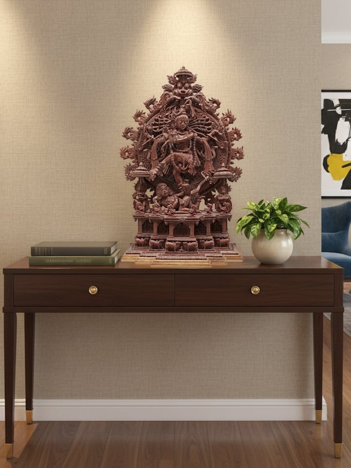 Carved stone Nataraj idol showing Tandav dance pose in traditional sculpture style
