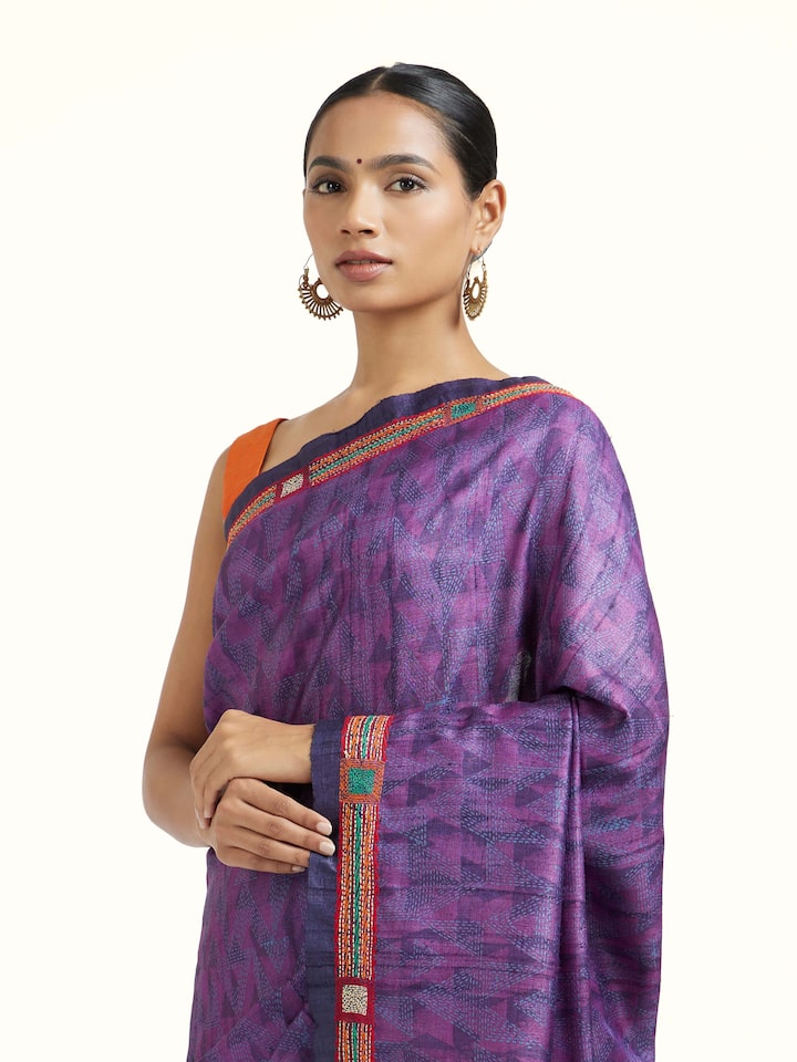 Angled view of the Purple Tussar Silk Discharge Block Printed Kantha Embroidered Saree