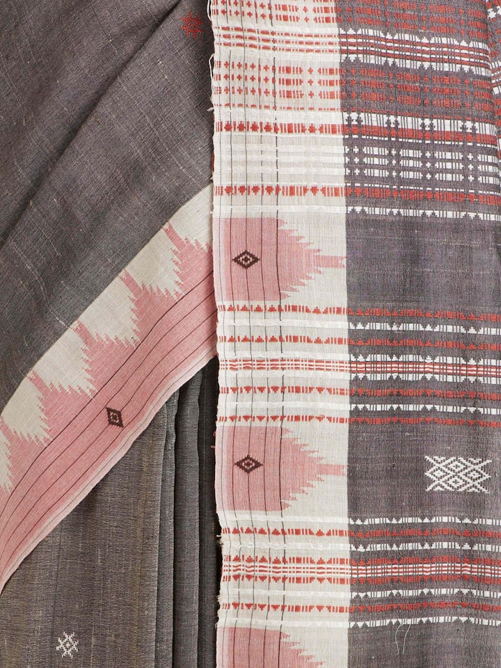 Detailed view of Brown Cotton Tussar Silk Kotpad Saree focusing on the fine craftsmanship and texture