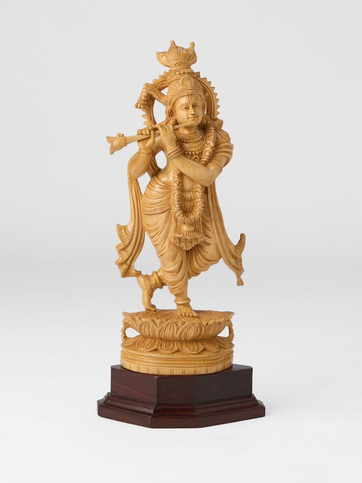 Front view of the Wood Carved Krishna Flute Idol