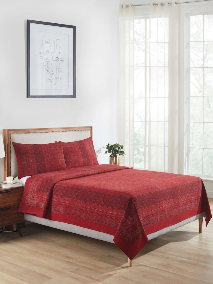 Close-up of Sindh maroon jaal cotton ajrakh block printed king bedspread set (3 pcs) highlighting the ajrakh block print details.