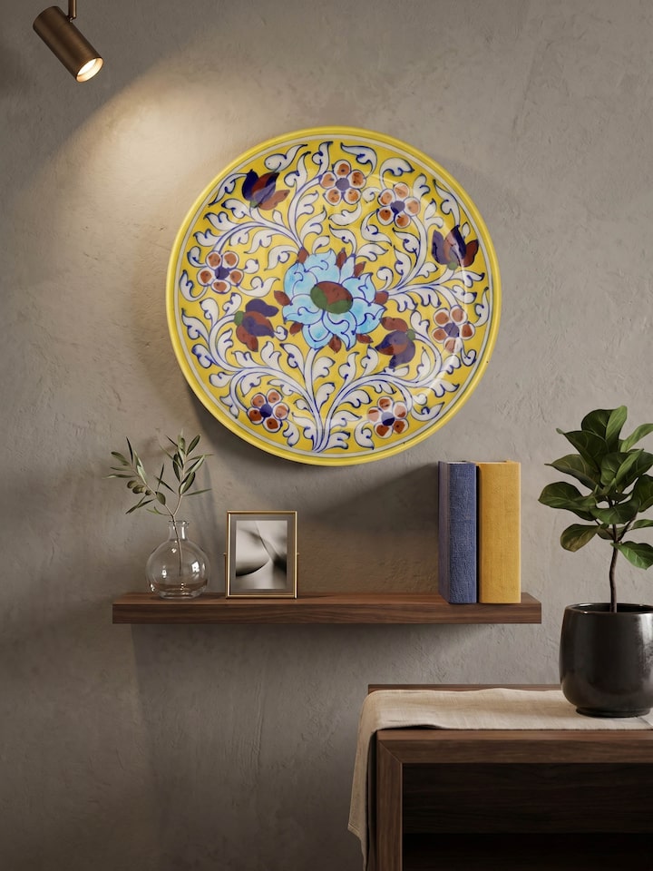 Styled view of Blue Pottery Ceramic Decorative Plate styled in a home setting