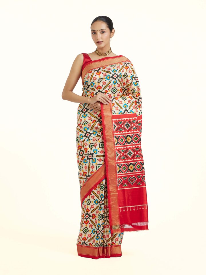 Front view of Off-White Pochampally Double Ikat Saree showcasing its traditional craftsmanship and design