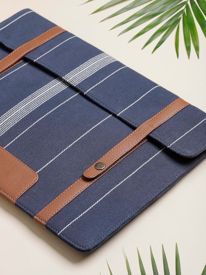 alternate lifestyle view of blue handloom cotton ipad sleeve