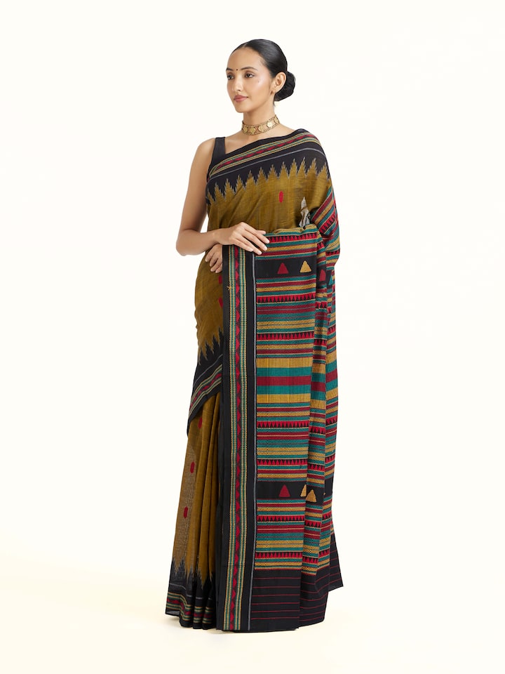 Side view of Yellow Cotton Dongaria Saree highlighting the detailed craftsmanship and elegant silhouette