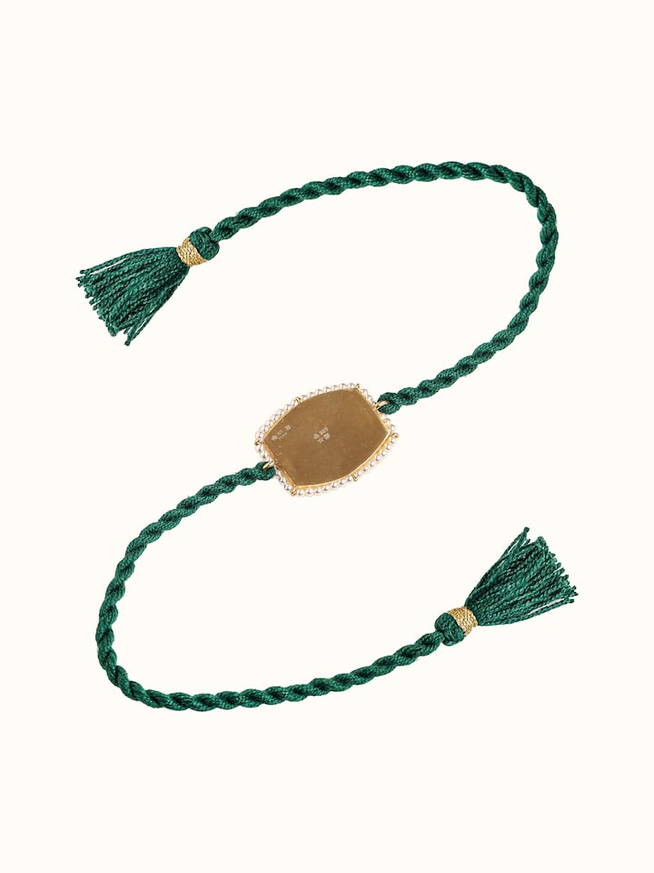Back view of Silversmithing Rakhi showing the back and clasp detail