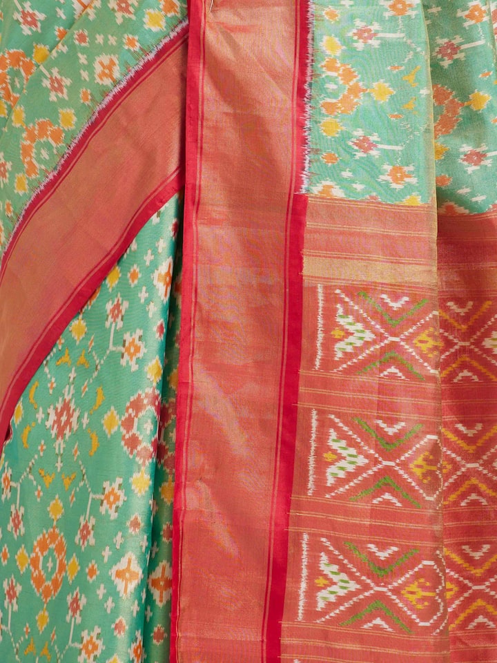 Detailed view of Brown Pochampally Ikat Silk Saree focusing on the fine craftsmanship and texture