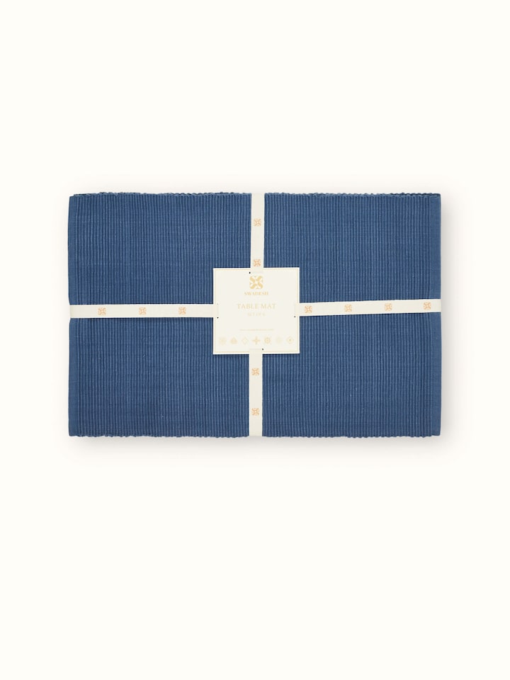 Detailed close-up emphasizing the fine cotton threads and craftsmanship in the handloom process