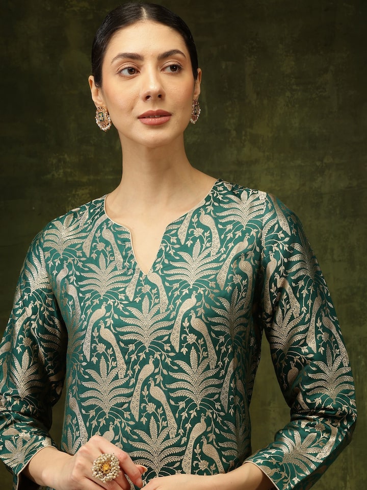Angled view highlighting the Banarasi silk fabric and detailed embroidery on Green Kurta