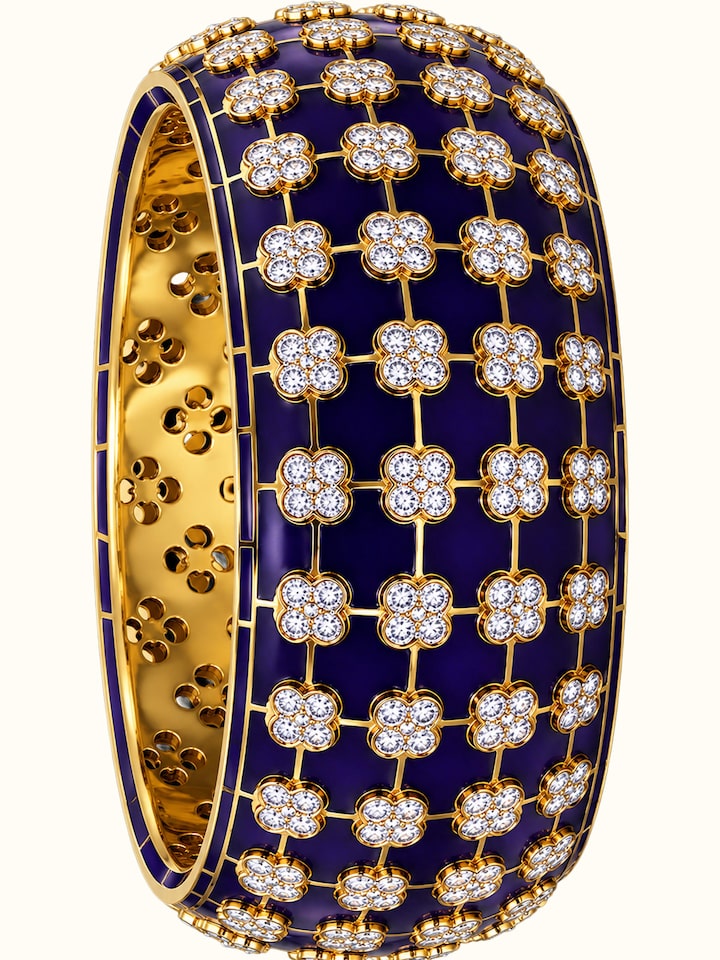 Detail view of Open Setting 14 Karat Yellow Gold Bangle with Diamonds highlighting the stone setting and metalwork detail